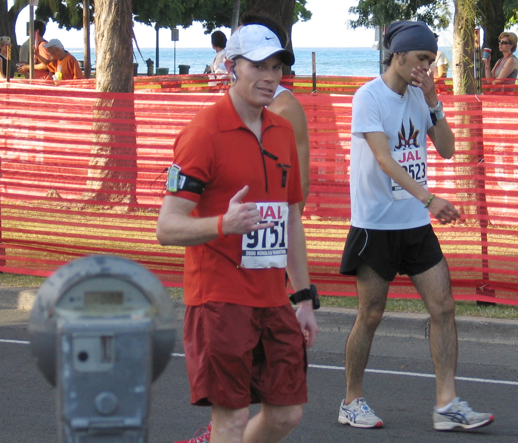 HONOLULU - Representing the 8th Fighter Wing, Capt. Jeremiah Reed gives the traditional 'push it up' sign of the 35th Fighter Squadron during the 2006 Honolulu Marathon Dec. 10. Captain Reed is expected to compete in the 11th Annual Air Force Marathon Sept. 15. He is the wing's flight safety officer. (Courtesy photo)   