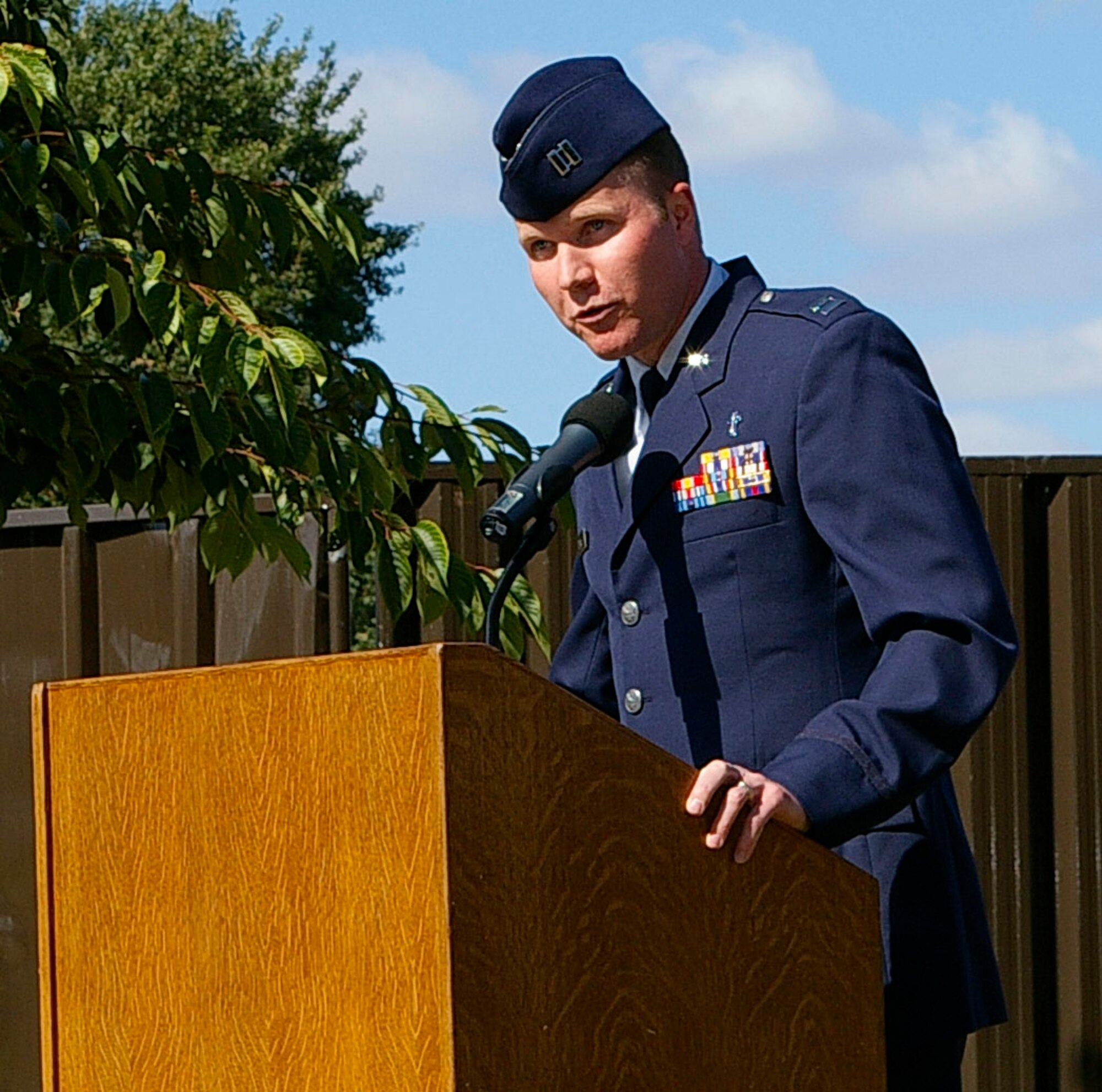 Chaplain (Capt.) Jason Peters, 100th Air Refueling Wing Chapel, speaks about his experience of Sept. 11, 2001, during a memorial service Tuesday to remember the victims of the terrorist attacks six years ago. (Photo by Karen Abeyasekere)