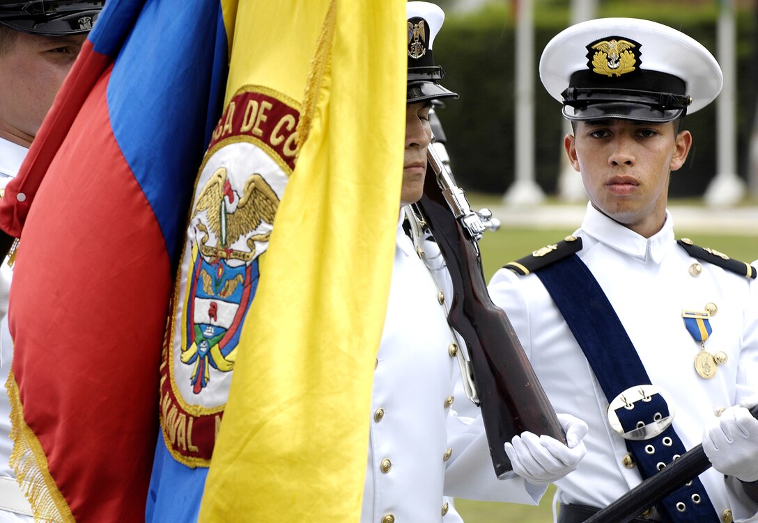 Colombian navy sailors march by Chairman of the Joint Chiefs of Staff Marine Gen. Peter Pace during a ceremony in Cartagena, Colombia, Sept. 13, 2007. 