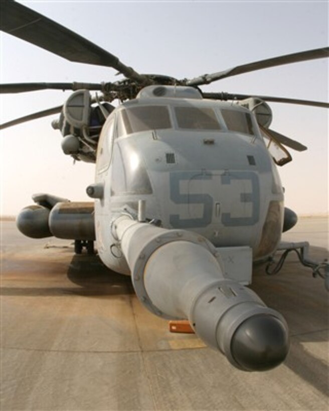 A CH-53E Super Stallion helicopter from Marine Heavy Helicopter Squadron 466 sits on the flight line at Al Asad Air Base, Iraq, on Sept. 6, 2007.  
