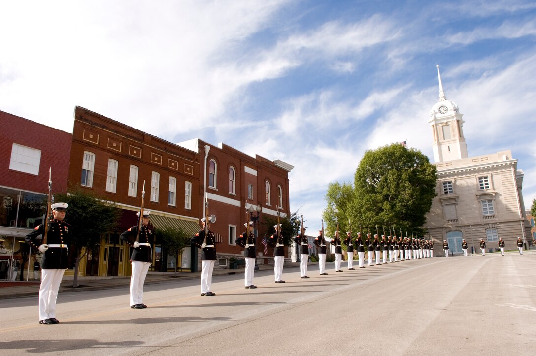 Members of the Marine Corps' Silent Drill Platoon perform in downtown Columbia, TN as part of the America's Marines campaign.  The program, initiated last September, is intended to strengthen America?s understanding of the Marine Corps and consists of the new television commercial, a nation-wide tour during the filming for the commercial, video documentary, and the interactive web site, where people can upload videos, photos and stories about the Marine Corps at www.Our.Marines.com