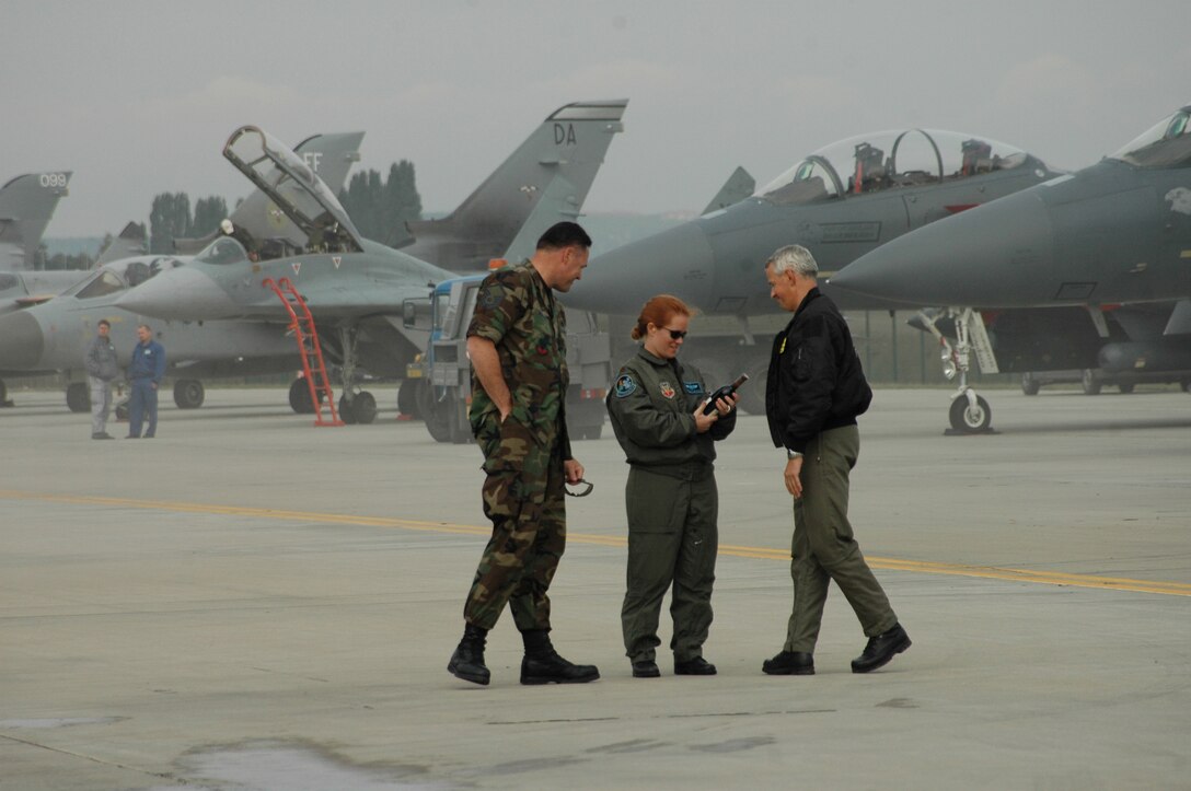 Maj. Katerina Brinson-Hart, 28th Operations Support Squadron,  is presented with a thank-you gift for the B-1's participation in the Czech Air Show. This Ellsworth Air Force Base, S.D., B-1 made history as the first B-1 to land in the Czech Republic. Czech Republic hosts were very grateful to the crew and support personnel for the B-1's first attendance in this air show. (U.S. Air Force photo/Airman 1st Class Kimberly Moore Limrick)
