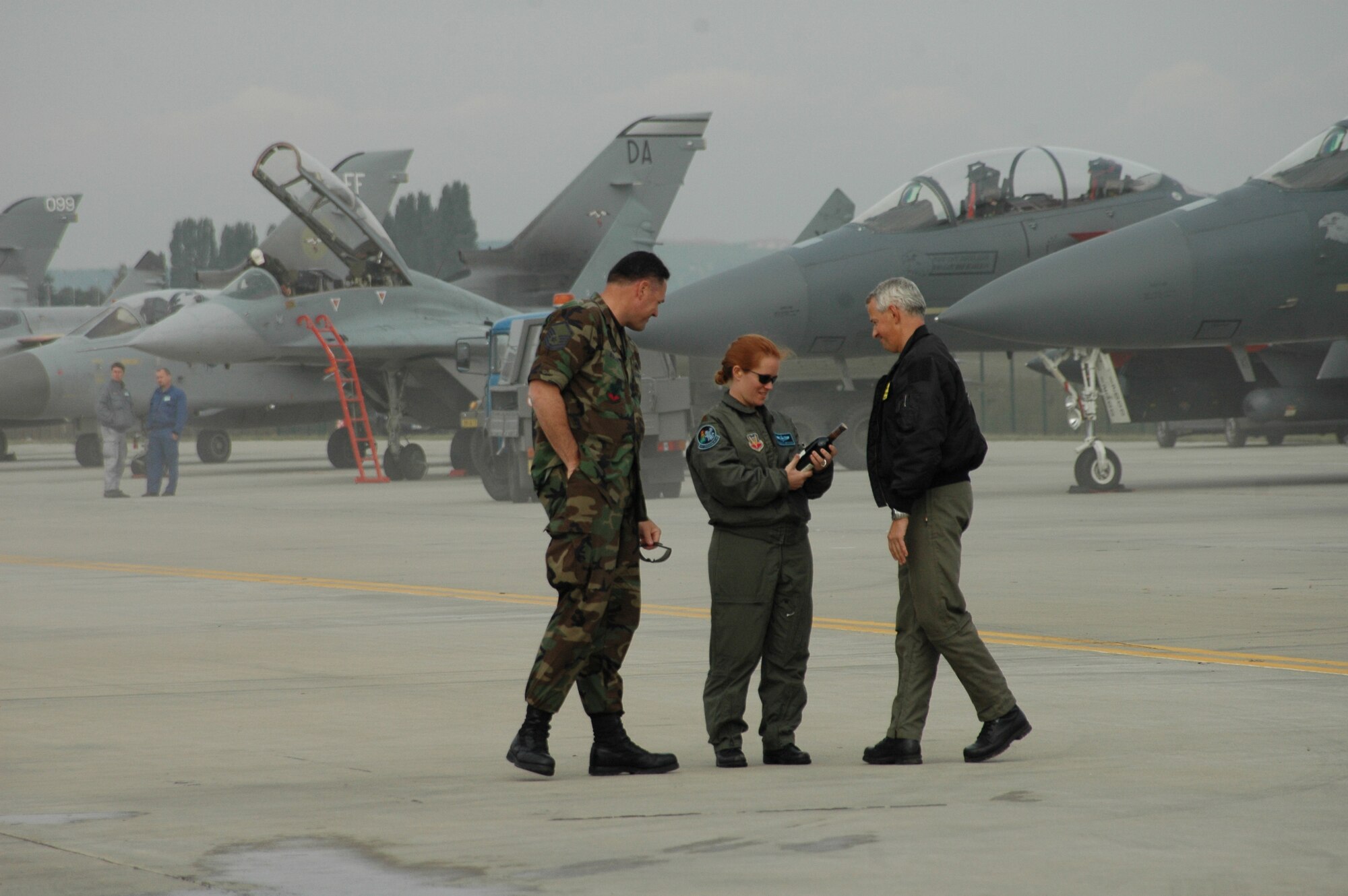Maj. Katerina Brinson-Hart, 28th Operations Support Squadron,  is presented with a thank-you gift for the B-1's participation in the Czech Air Show. This Ellsworth Air Force Base, S.D., B-1 made history as the first B-1 to land in the Czech Republic. Czech Republic hosts were very grateful to the crew and support personnel for the B-1's first attendance in this air show. (U.S. Air Force photo/Airman 1st Class Kimberly Moore Limrick)
