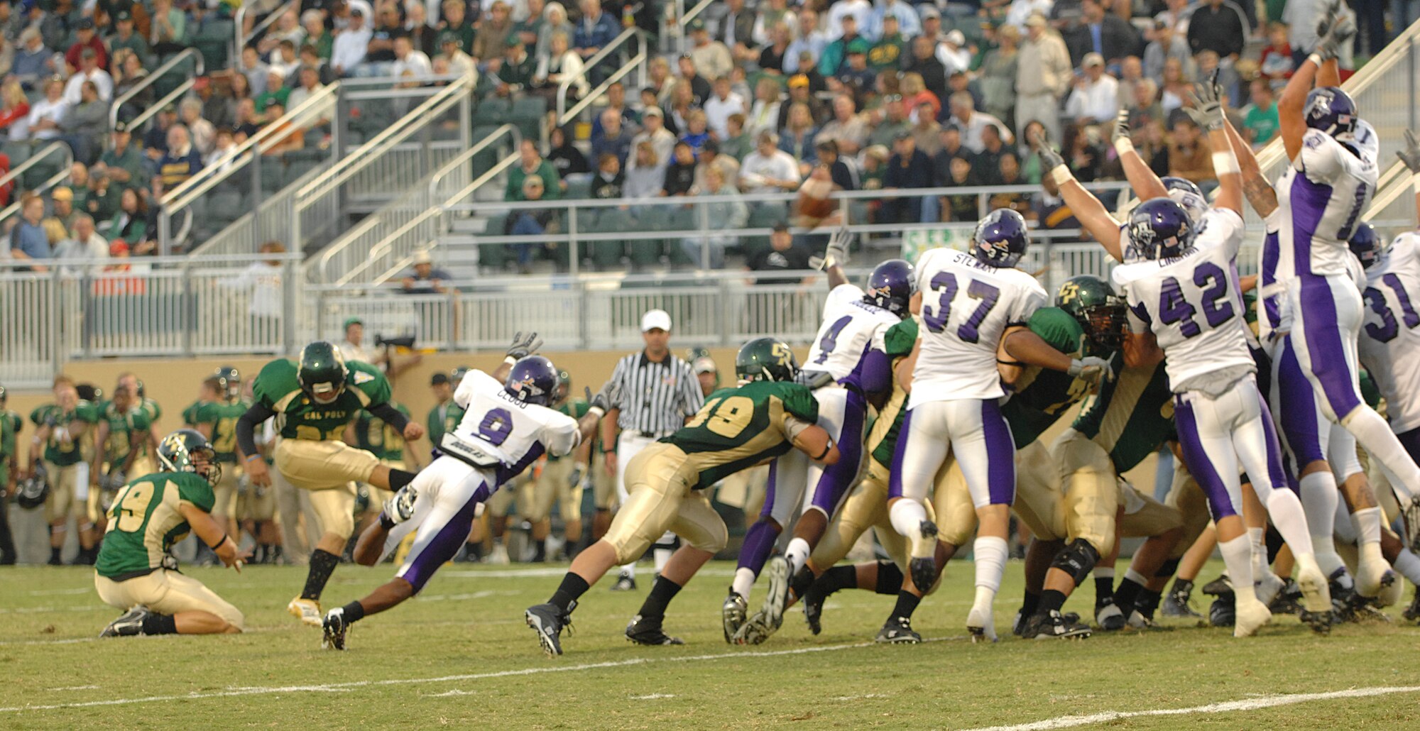 VANDENBERG AIR FORCE BASE, Calif. -- Cal-Poly kicks a field goal towards its 47 to 19 stomping of Weber State during the California Polytechnic State University military appreciation night on Sept. 15. The game and barbecue was available to military members. (U.S. Air Force photo/Staff Sgt. Vanessa Valentine)