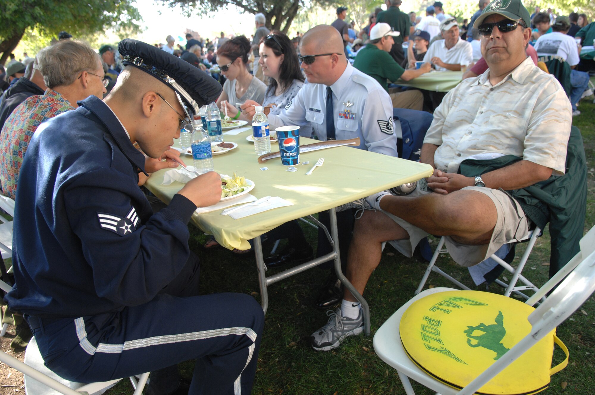 VANDENBERG AIR FORCE BASE, Calif. -- Vandenberg Airmen enjoy Santa Maria style barbecue during the California Polytechnic State University military appreciation night on Sept. 15. The game and barbecue was available to military members. (U.S. Air Force photo/Staff Sgt. Vanessa Valentine)

