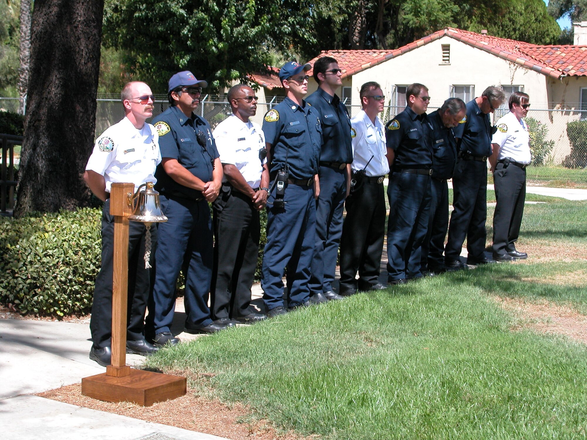 Members of 452nd Fire Emergency Services lined up outside the base chapel for the ringing of the bell portion of the 9/11 memorial service held Tuesday.  (U.S. Air Force photo by LaGina Jackson)