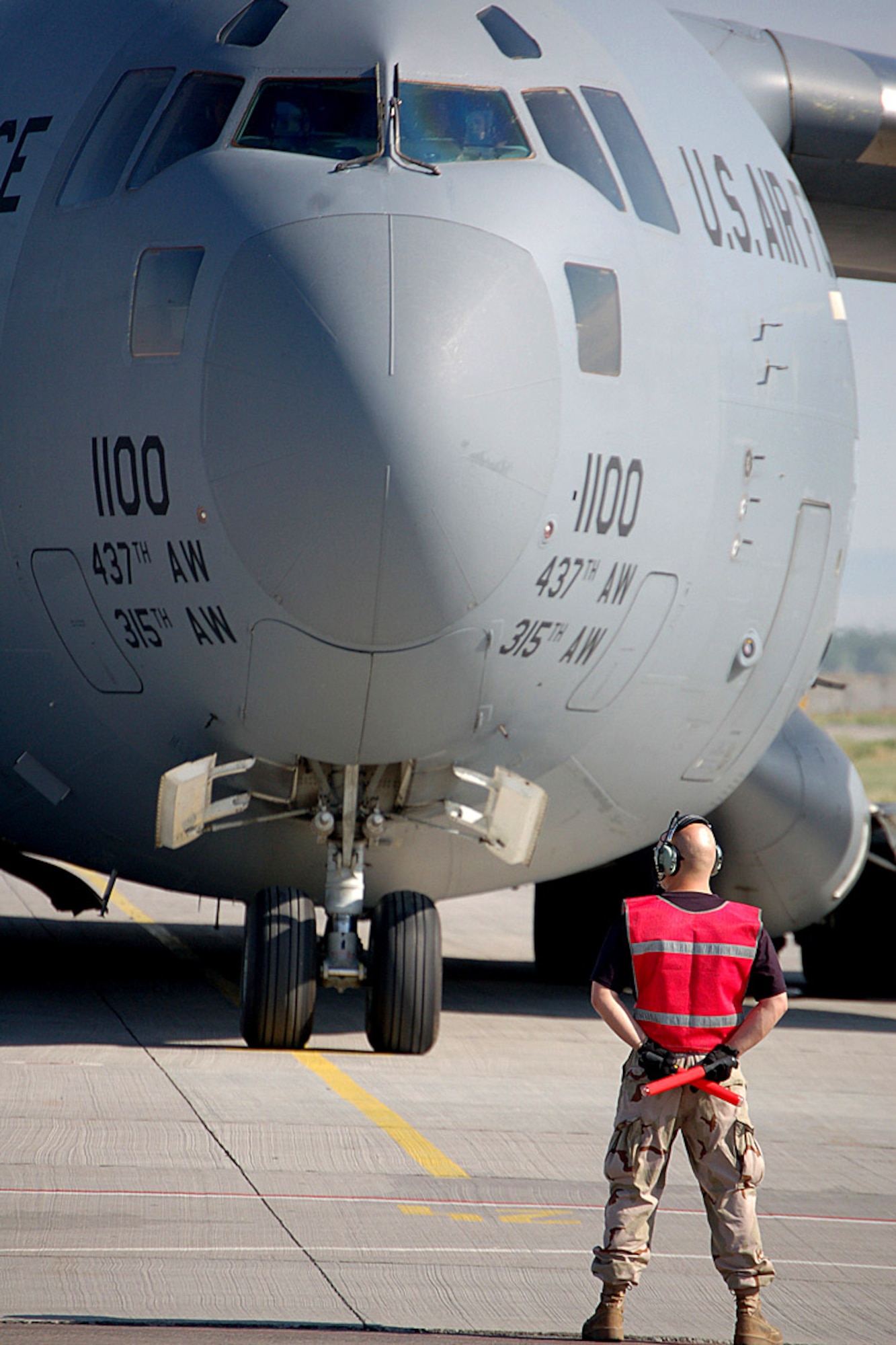 A C-17 Globemaster III sits on the ramp at Manas Air Base, Kyrgyzstan. C-17s play a vital role in moving cargo and passengers in support of operations in Afghanistan, Iraq and the Horn of Africa. (U. S. Air Force photo/Staff Sgt. Les Waters)
