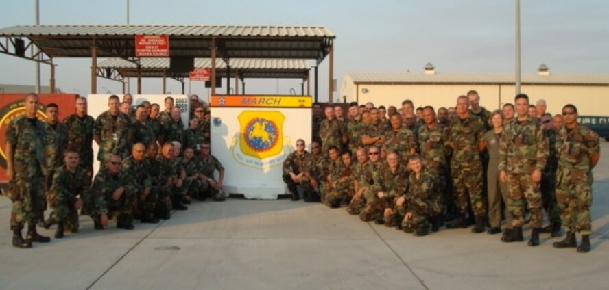 Reservist from March ARB gather around a mural in front of the maintenance
complex at Incirlik AB, Turkey. The mural was painted by Staff Sgt. Will Viars,
from the 752nd Aircraft Maintenance Squadron. (U.S. Air Force photo)