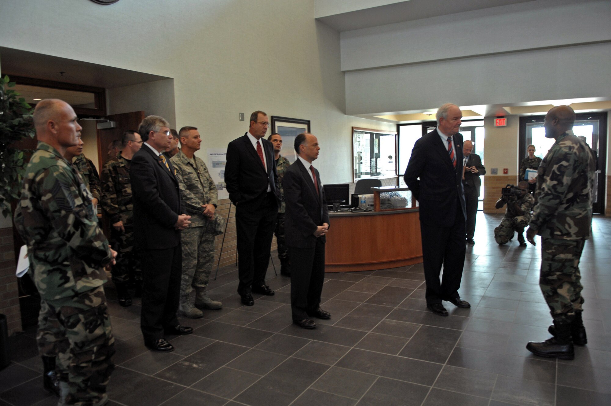 Secretary of the Air Force Michael W. Wynne and John Vonglis are briefed on the new Air Force Financial Services Center operations Sept. 14 at Ellsworth Air Force Base, S.D. Mr. Vonglis is the principal deputy assistant secretary of the Air Force for financial management. (U.S. Air Force photo/Airman 1st Class Anthony Sanchelli)
