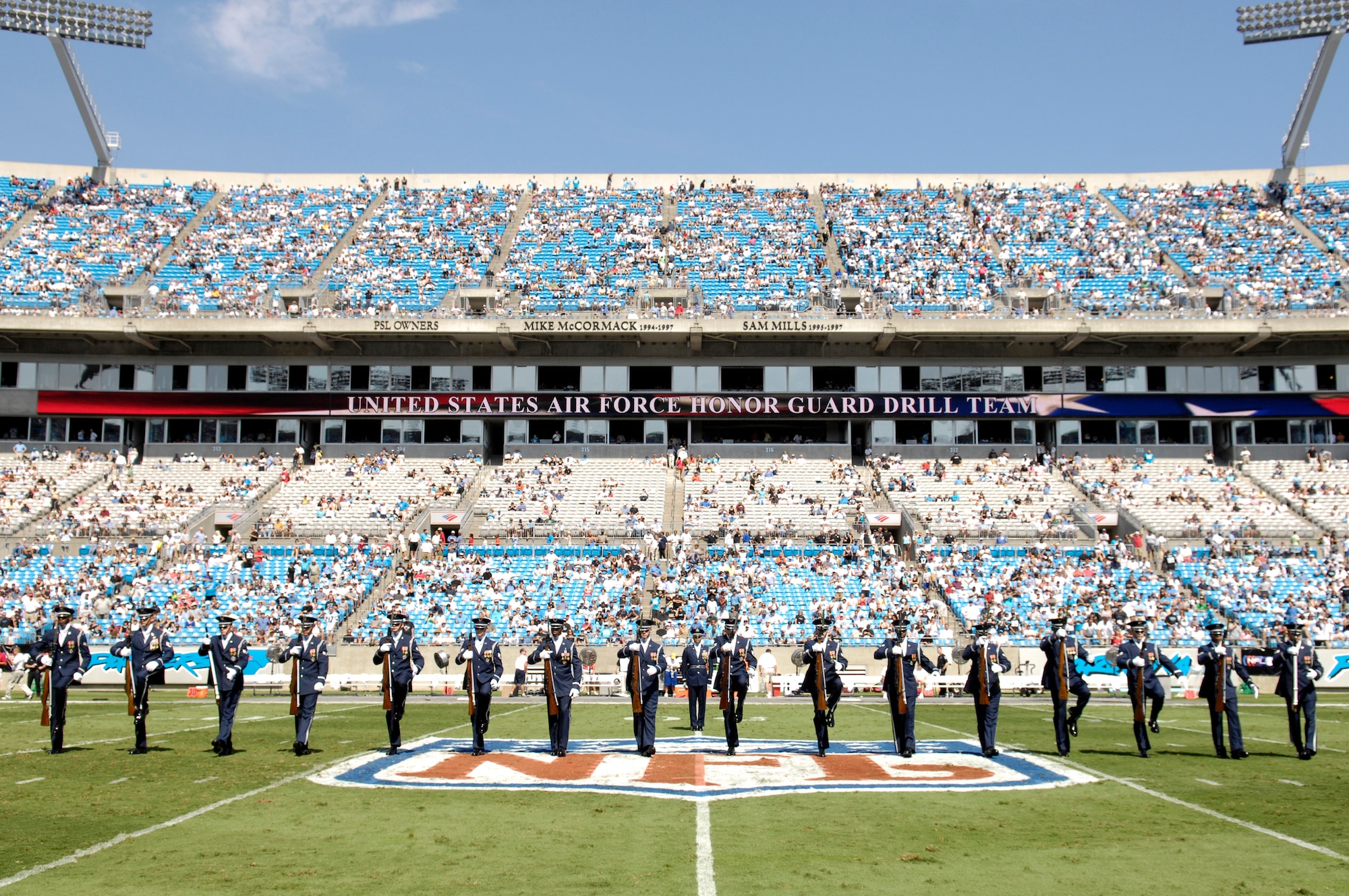 Members of the USAF Honor Guard Drill Team perform during halftime at the NFL's Carolina Panthers vs. Houston Texans football game. During their recent tour, the Drill Team joined all three major AF installations in New Mexico for their joint AF Ball and then the NFL at the Carolina Panthers game, focused on their mission to recruit, retain and inspire while celebrating the AF 60th Birthday.(U.S. Air Force photo by Senior Airman Daniel DeCook)(Released)
