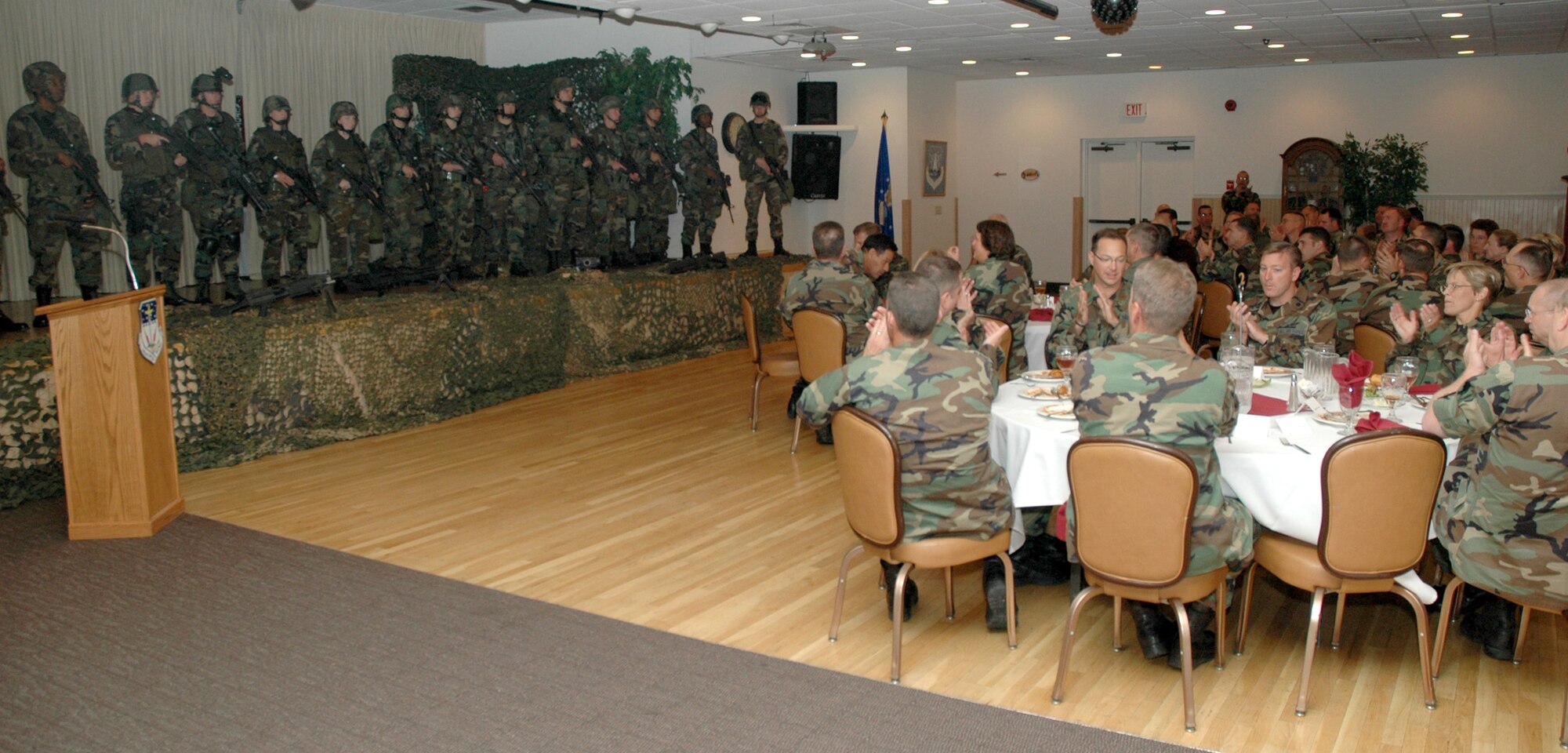 Security forces Airmen from various squadrons at Malmstrom receive a round of applause following demonstrations and descriptions of their respective missions during a luncheon at Malmstrom Air Force Base Sept. 12. The luncheon was held to enhance working relationships and build functional bridges between Malmstrom and Montana Air National Guard leadership. (U.S. Air Force photo/Airman 1st Class Dillon White)
