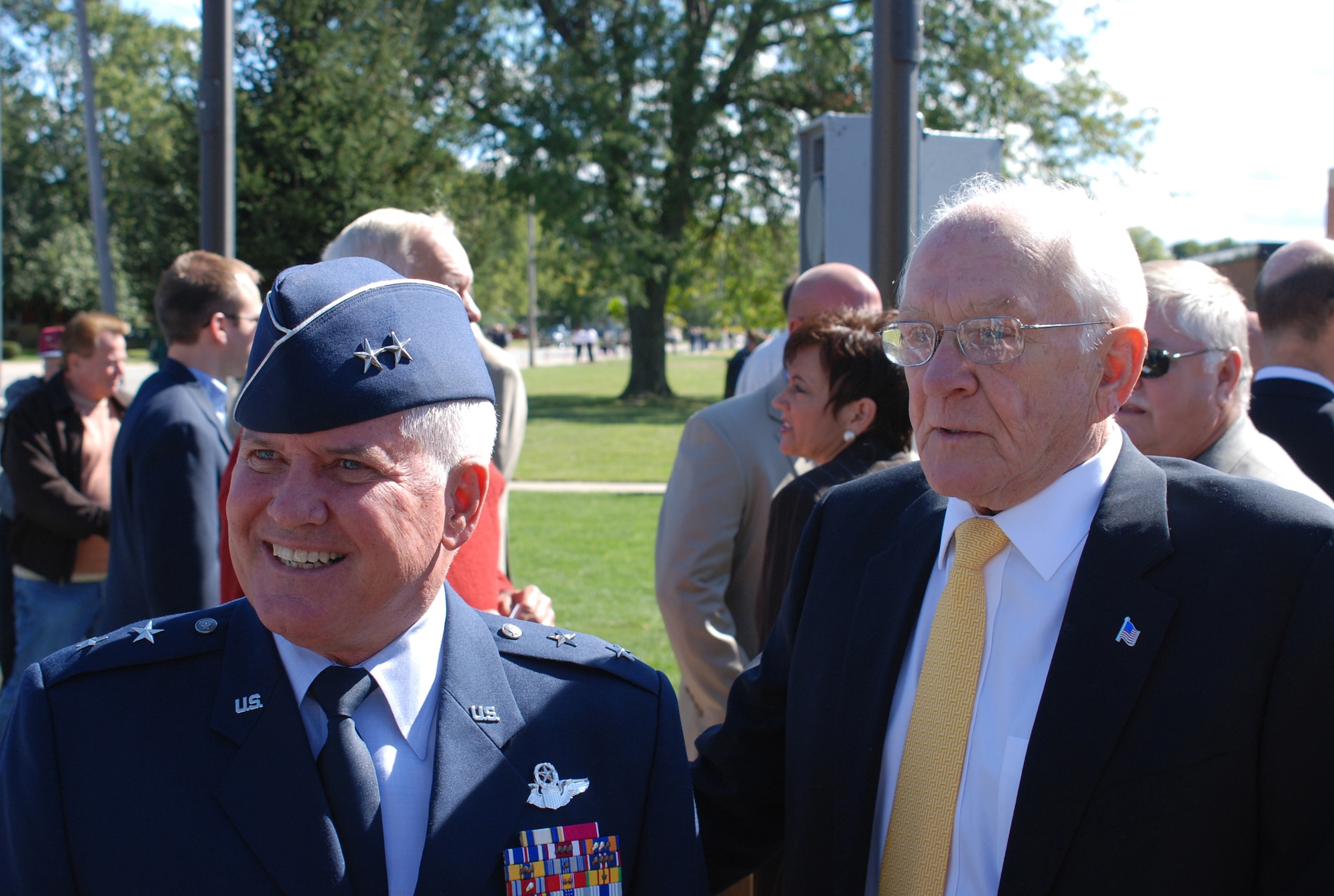 Maj. Gen. Allan R. Poulin, left, vice commander of Air Force Reserve Command, and retired Col. James H. Kasler chat with other people after the Kasler-Momence Veterans Park dedication in Momence, Ill., Sept. 15, 2007. The general's parents and Colonel Kasler became friends when the colonel was in the Air Force. (U.S. Air Force photo/Maj. Karl D. Lewis)