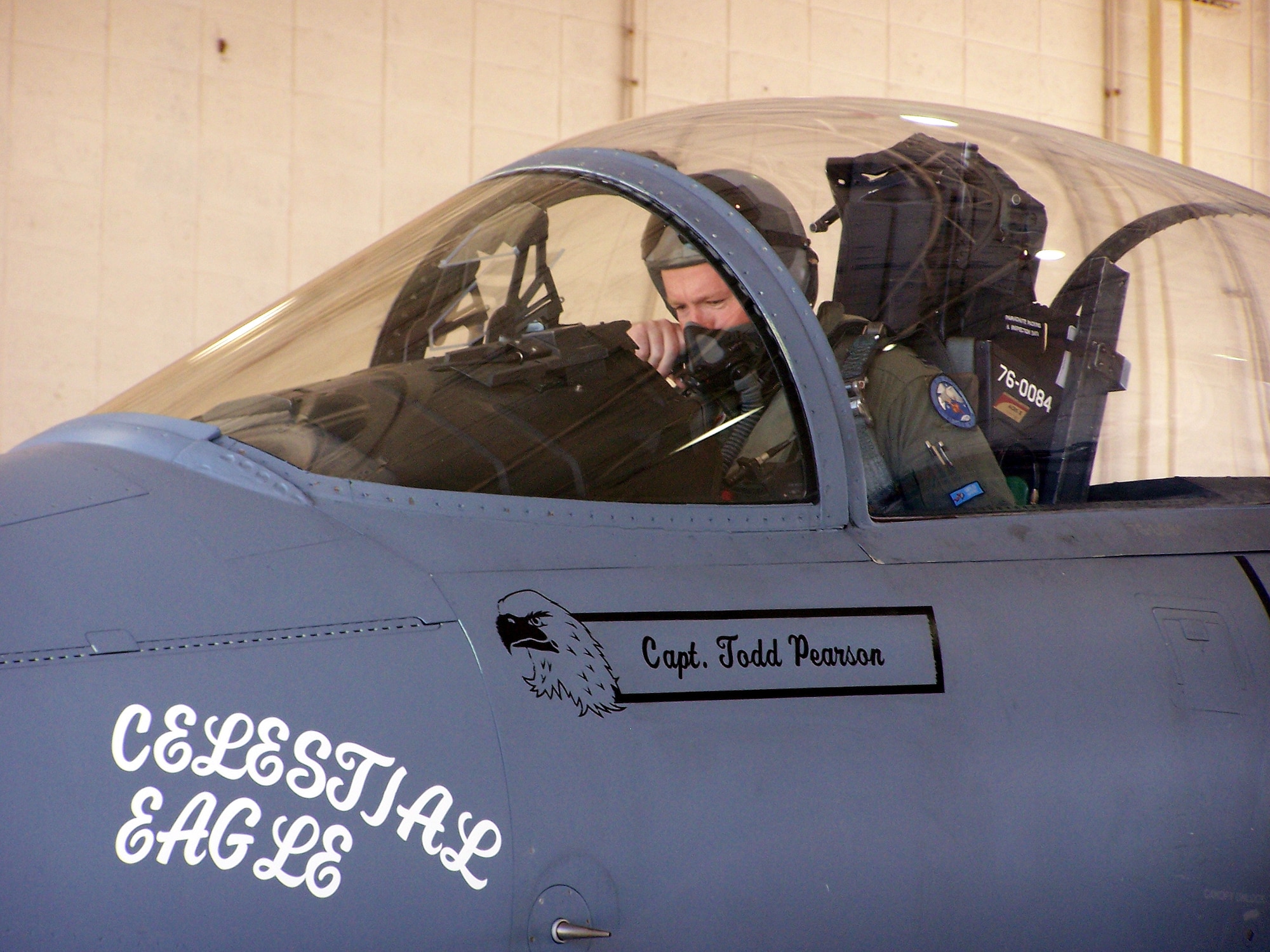 Capt. Todd Pearson, 390th Fighter Squadron pilot from Mountain Home Air Force Base, Idaho, performs pre-flight checks on an F-15A at the Florida Air National Guard 125th Fighter Wing located at Homestead Air Reserve Base, Fla., during the Celestial Eagle Remembrance Flight on Sept. 13. Captain Pearson’s father, retired Maj. Gen. Doug Pearson, flew the exact same F-15, now assigned to the 125th FW, exactly 22 years prior while accomplishing the only successful satellite kill by an aircraft launched missile in history. (U.S. Air Force photo/Senior Airman Erik Hofmeyer)