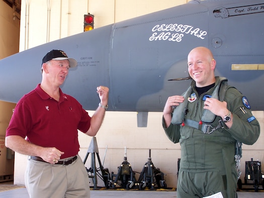 Retired Maj. Gen. Doug Pearson (left) and Capt. Todd Pearson (right), 390th Fighter Squadron pilot from Mountain Home Air Force Base, Idaho, joke around before Captain Pearson took off on the Celestial Eagle remembrance flight Sept. 13 at Homestead Air Reserve Base. General Pearson flew the exact same F-15, now assigned to the Florida Air National Guard 125th Fighter Wing, exactly 22 years prior while accomplishing the only successful satellite kill by an aircraft launched missile in history. (U.S. Air Force photo/Senior Airman Erik Hofmeyer)