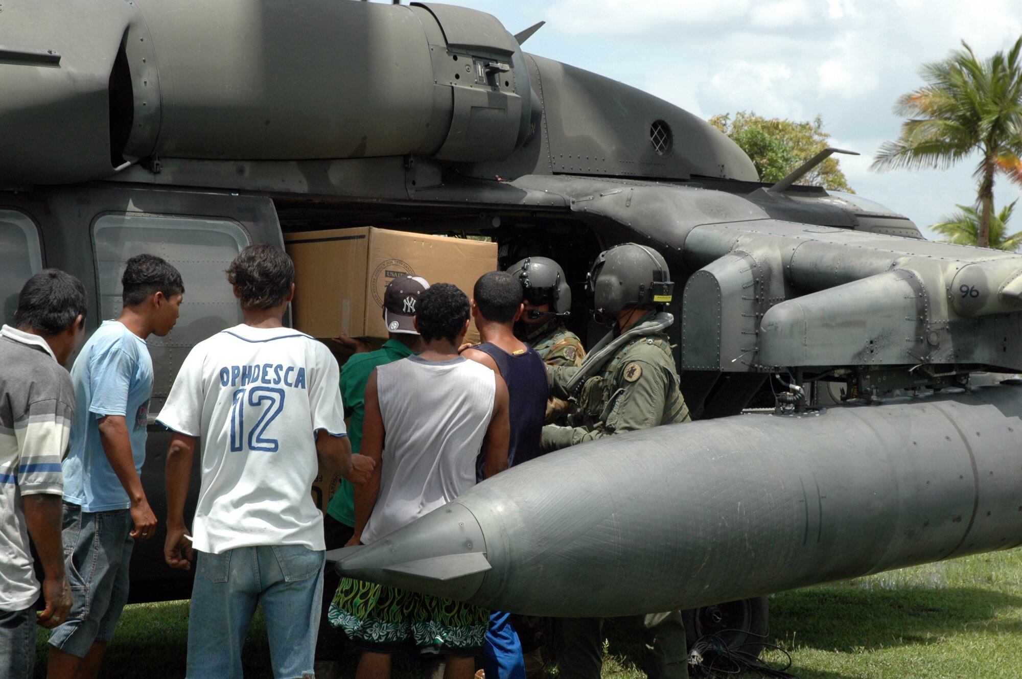 PUERTO CABEZAS, Nicaragua –  Aircrews from Joint Task Force Bravo in Honduras distribute relief supplies Sept. 15 in small communities along the coast near Puerto Cabezas, Nicaragua.  The U.S. State Department and Department of Defense are working together to bring food, water and other needed items to small communities on the Nicaraguan coast that were affected by the hurricane.  (Army photo by Specialist Grant Vaught)