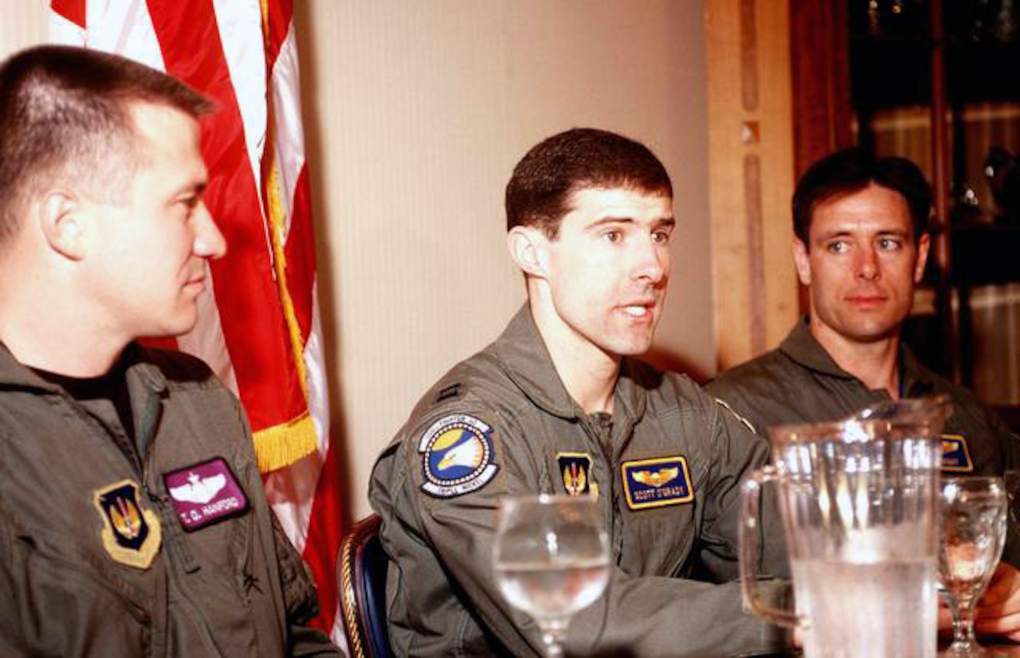 Capt. Scott O'Grady talks to Airmen from the 31st Fighter Wing at Aviano Air Base, Italy, about his experience after evading capture in 1995.  Capt. O'Grady, with the 555th Fighter Squadron at Aviano, ejected from his F-16 over Bosnia, after his aircraft was hit by a rocket from the Bosnian Serb Army. He eluded capture by Serbian forces for five days before being picked up by a U.S. Marine Corps rescue helicopter. (Courtesy photo)