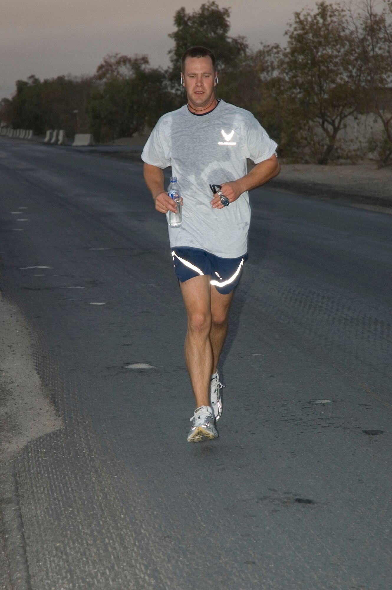 An Airman with the 386th Air Expedtionary Wing participates in a half marathon here Sept. 15. The 386th Expeditionary Services Squadron hosted the event to support the Annual Air Force Marathon which also took place on the same day.  (U.S. Air Force photo Staff Sgt. Tia Schroeder) 
