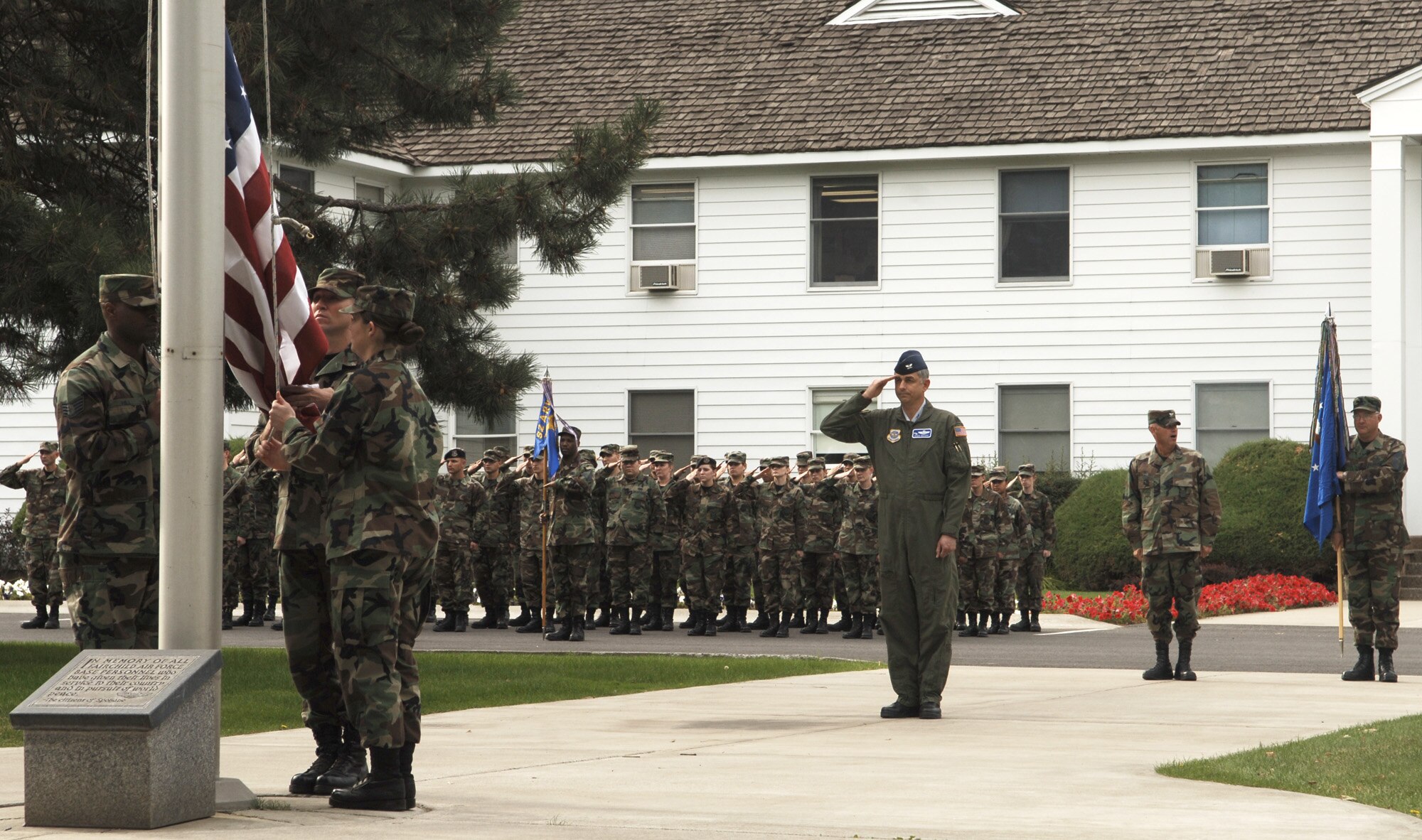 FAIRCHILD AIR FORCE BASE, Wash. – In recognition of the 60th Anniversary of the U.S. Air Force, members representing the 92nd Air Refueling Wing Salute the flag during a special Retreat ceremony Sept. 18. (U.S. Air Force photo / Senior Airman Chad Watkins)