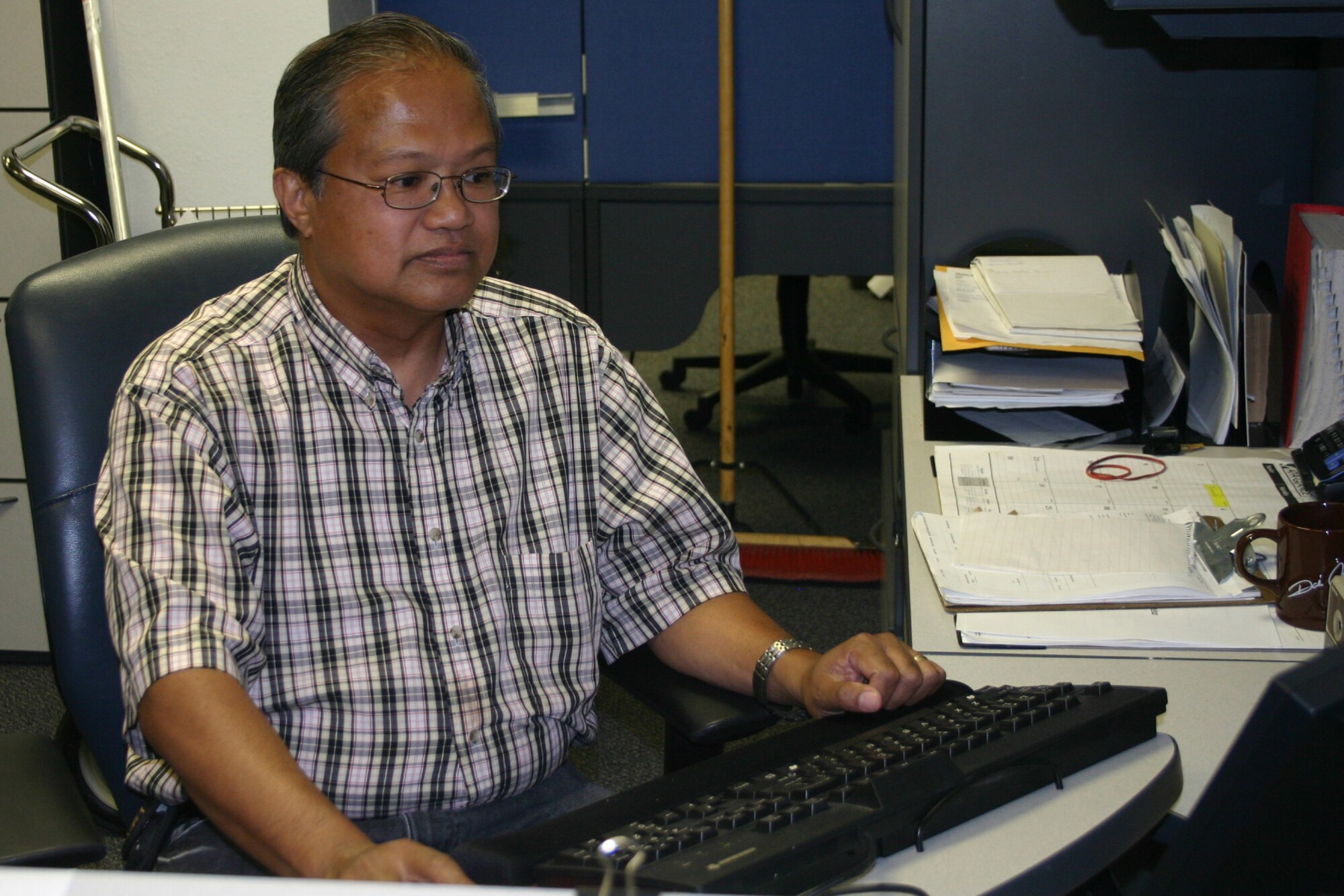 Adrian Sibayan, 82nd Medical Support Group, coached Suzy Haudenshild, 82nd Mission Support Group, through CPR procedures over the telephone on Aug. 9 as her son, Nicholas, was seconds away from death. His efforts saved the life of Mrs. Haudenshild’s son. (U.S. Air Force photo/Staff Sgt. Tonnette Thompson)
