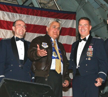 Brig. Gen. Thomas M. Gisler, Jr., 349th Air Mobility Wing commander and Col. Steve Arquiette, 60th AMW commander, present celebrity guest Jay Leno, host of NBC’s Tonight Show, with some mementos in appreciation to his continuing support of all military members at the Team Travis  Air Force’s 60th birthday at a military ball held at Travis Air Force Base, Sept. 16. 