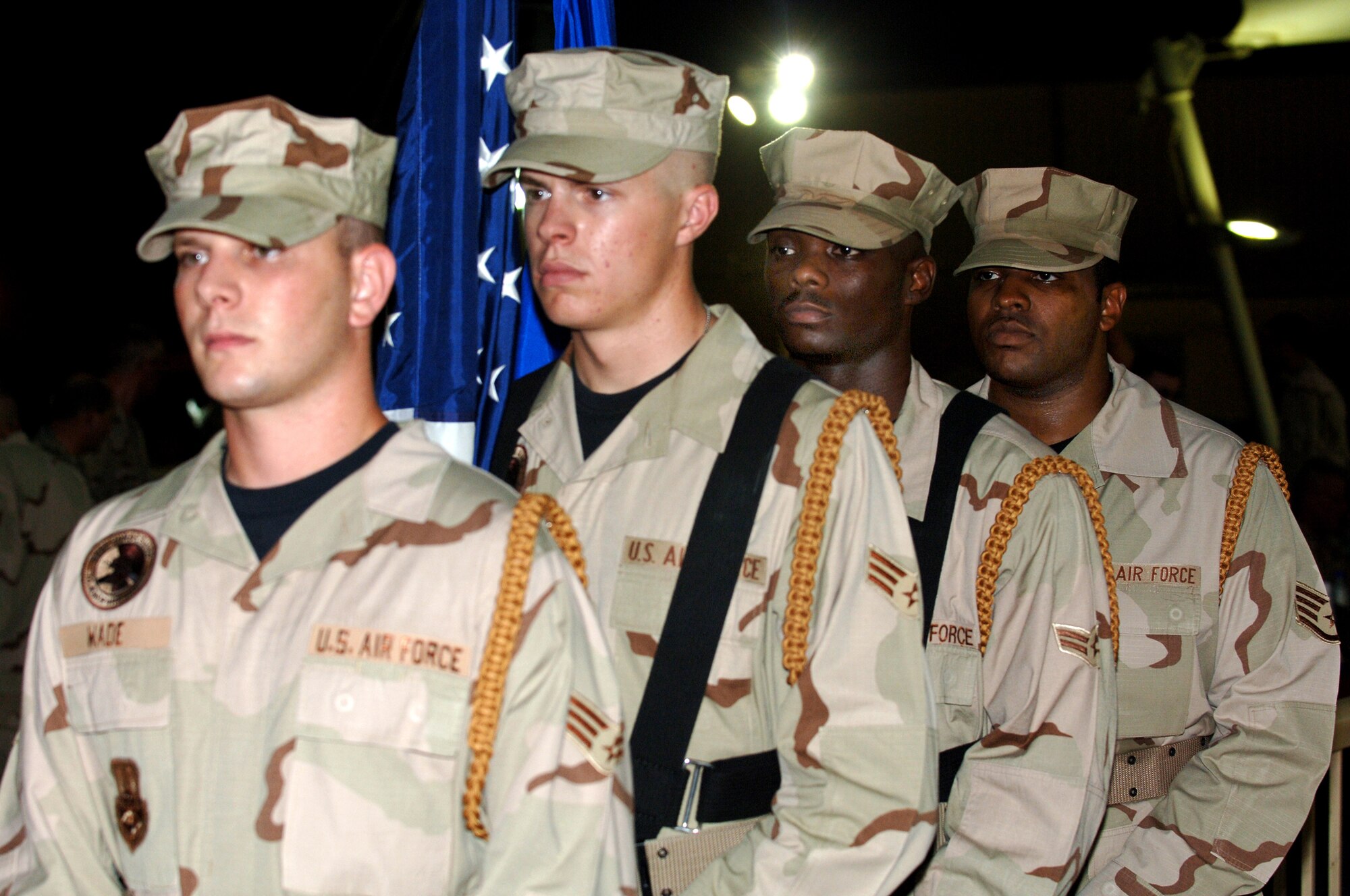 SOUTHWEST ASIA -- Members of the 379th Air Expeditionary Wing Honor Guard stand ready to present the colors during a Dining-In held to celebrate the Air Force’s 60th Anniversary Tuesday. (U.S. Air Force photo/Master Sgt. Greg Kunkle)
