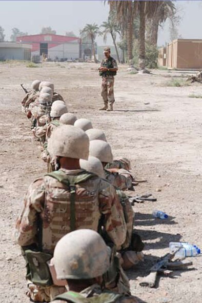 AR RUSTAMIYAH, Iraq - Junior term cadets receive instruction on bounding movements across open areas before practicing the skill during their first field exercise Sept. 4. (U.S. Air Force photo / Senior Airman Christie Putz)