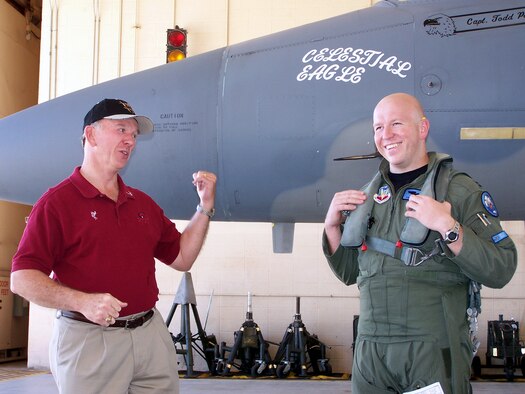 Retired Maj. Gen. Doug Pearson (left) and Capt. Todd Pearson, a 390th Fighter Squadron pilot from Mountain Home Air Force Base, Idaho, joke around Sept. 13 prior to Captain Pearson taking off on the Celestial Eagle remembrance flight at Homestead Air Reserve Base, Fla. General Pearson flew the exact same F-15 Eagle, now assigned to the Florida Air National Guard 125th Fighter Wing, exactly 22 years prior while accomplishing the only successful satellite kill by an aircraft launched missile in history. (U.S. Air Force photo/Senior Airman Erik Hofmeyer) 