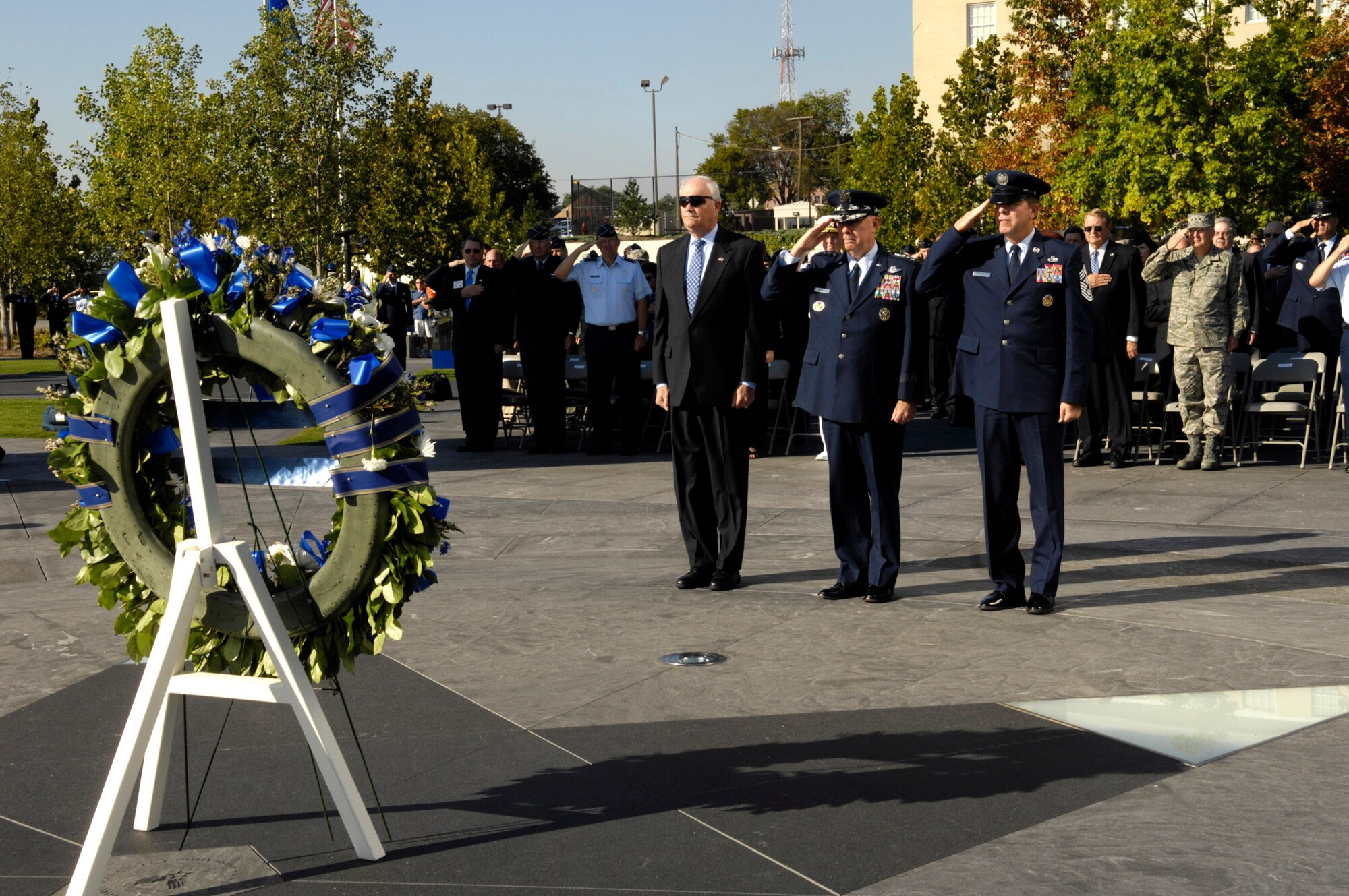 Secretary of the Air Force Michael W. Wynne, Air Force Chief of Staff Gen. T. Michael Moseley and Chief Master Sgt. of the Air Force Rodney J. McKinley pay their respects during the wreath-laying ceremony Sept. 18 at the Air Force Memorial in Arlington, Va., in honor of the 60th anniversary of the Air Force. (U.S. Air Force photo/Senior Airman Rusti Caraker)