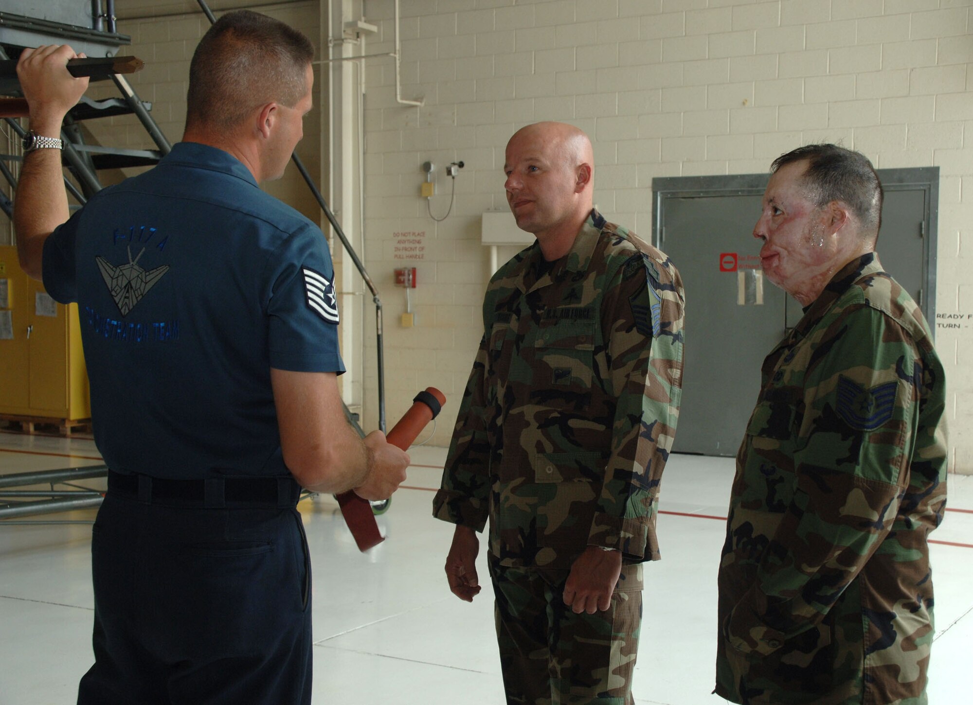 Tech Sgt. Israel DelToro and Master Sgt. Eric Brandenburg visit Holloman to get a tour of the base and tell Airmen their stories of being in combat and why they stay in the Air Force. Many Airmen were inspired by the speeches the two Air Force heroes gave during the Warrior Call. (U.S. Air Force photo/Airman 1st Class Tiffany Trojca.)