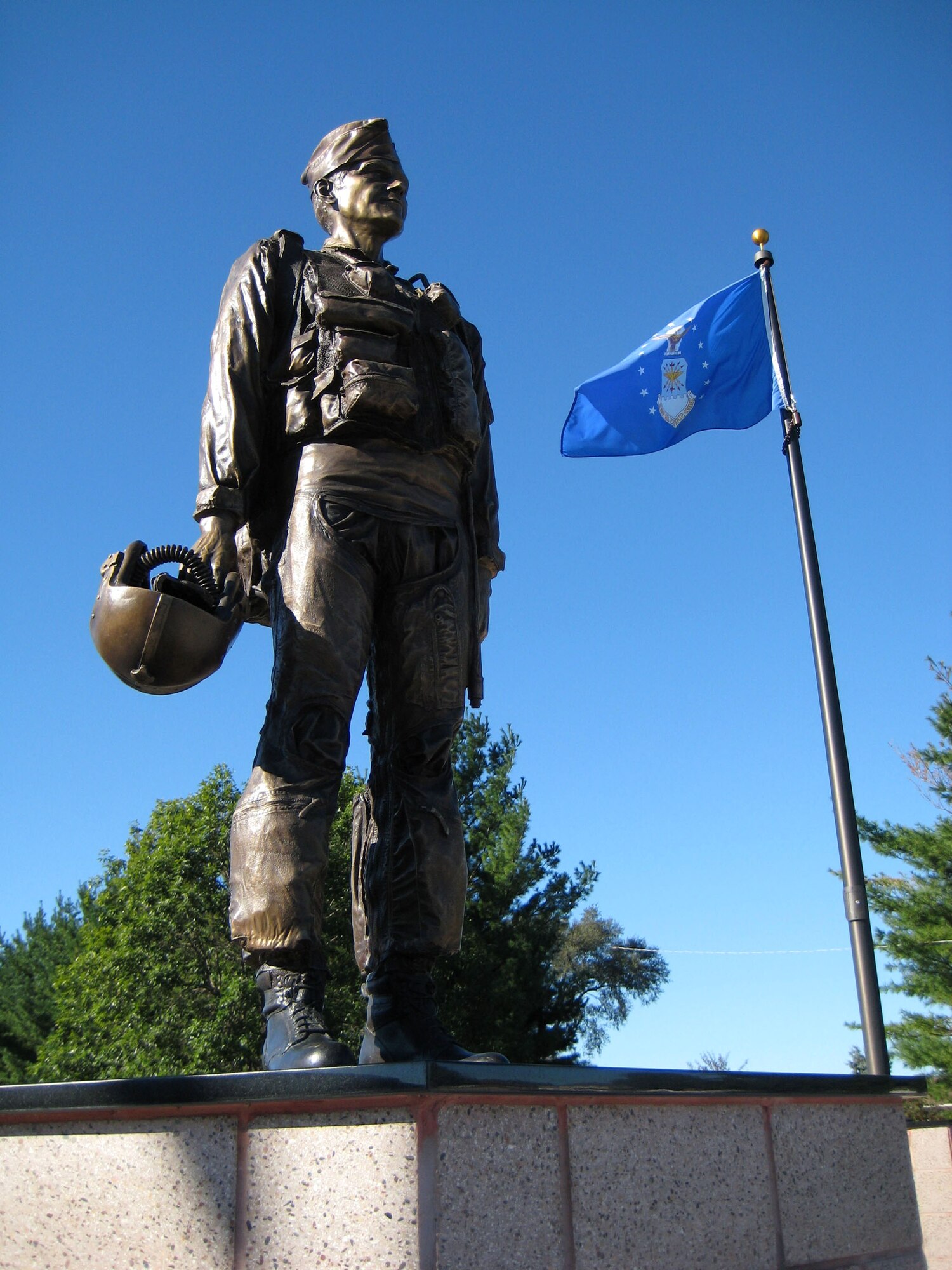 A bronze statue of retired Col. James H. Kasler was unveiled during a Sept. 15 veteran's memorial dedication in Momence, Ill. Colonel Kasler, a decorated war hero and prisoner during the Vietnam War, is the only Airman to be awarded three Air Force Crosses. (U.S. Air Force photo/1st Lt. Dustin Doyle)