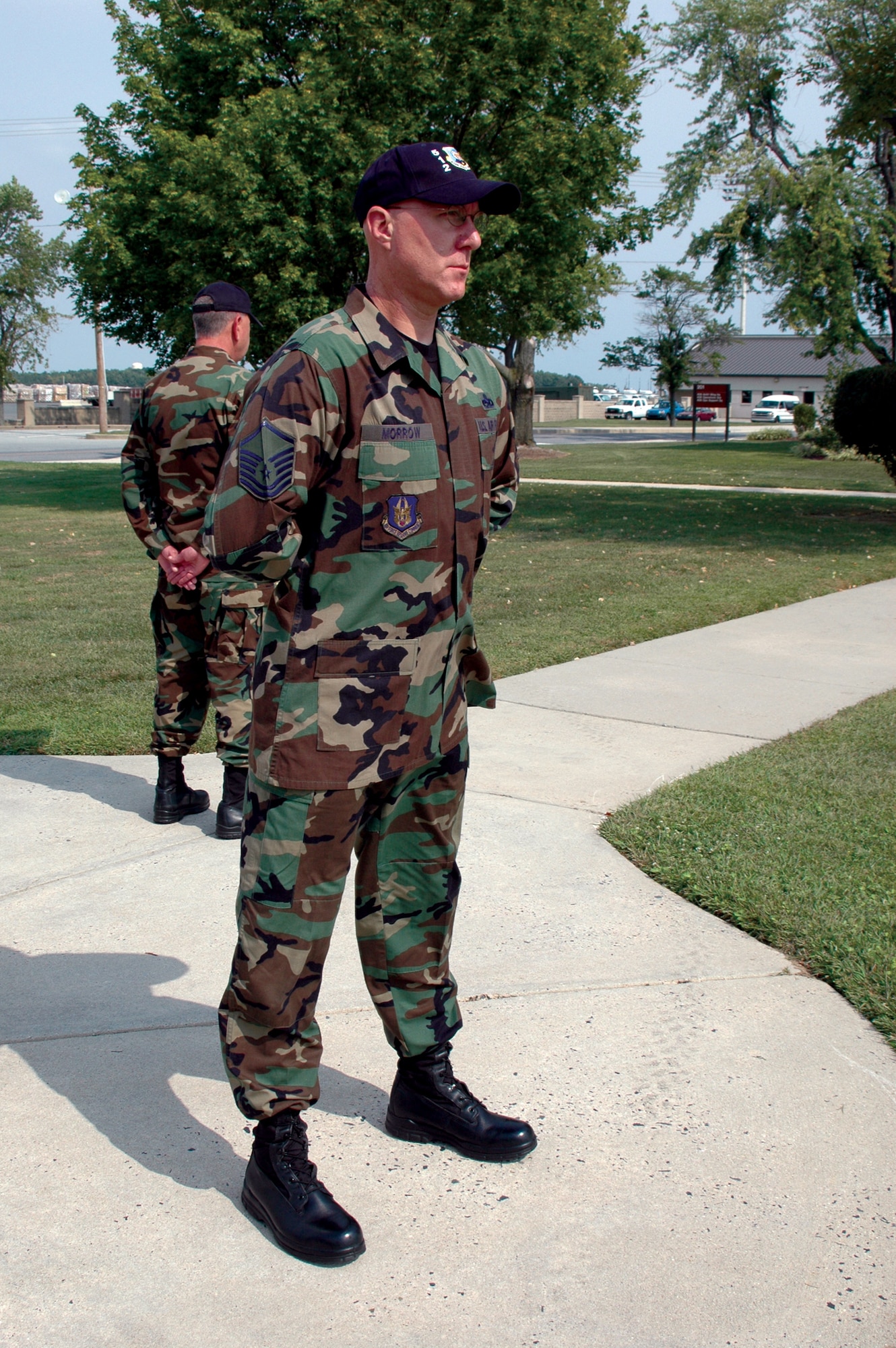 DOVER AIR FORCE BASE, Del. -- Master Sgt. Kevin Morrow, 512th Maintenance Operations Flight first sergeant here with the Air Force Reserve Command's 512th Airlift Wing, stands in solemn remembrance of POW/MIAs Sept. 14 at the base flagpole. Squadrons throughout the base took turns standing in recognition.