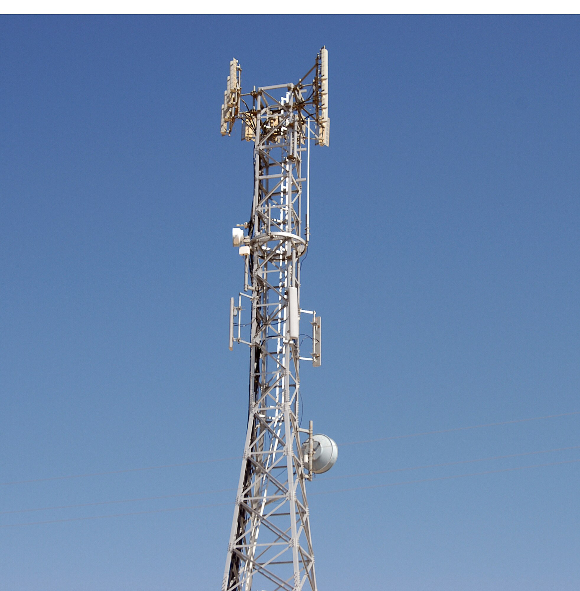 A Verizon antenna mounted at the tower at building 2600. Improved Verizon wireless and broadband services are currently available here as part of a three-month Verizon Wireless demonstration. The Verizon system will be removed after the demonstration is concluded. At that time, Verizon's signal strengths will return to pre-existing levels. (Photo by Senior Airman Jason Hernandez)