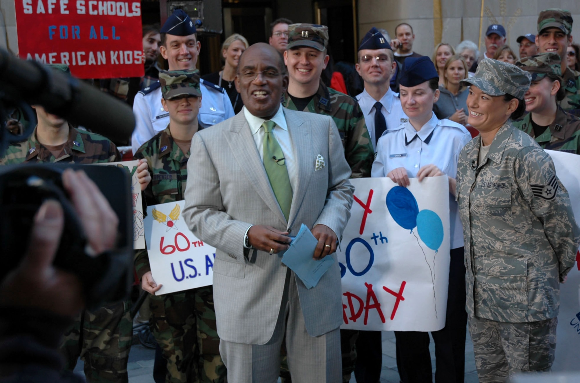"Today" show weatherman Al Roker wishes the Air Force a happy 60th birthday on the set of the "Today" show Sept. 18 in New York City. Airmen and cadets from Air Force ROTC Det. 560 at Manhattan College visited the show with Staff Sgt. Amy Harkins to mark the occasion. (U.S. Air Force photo/Maj. John Thomas)
