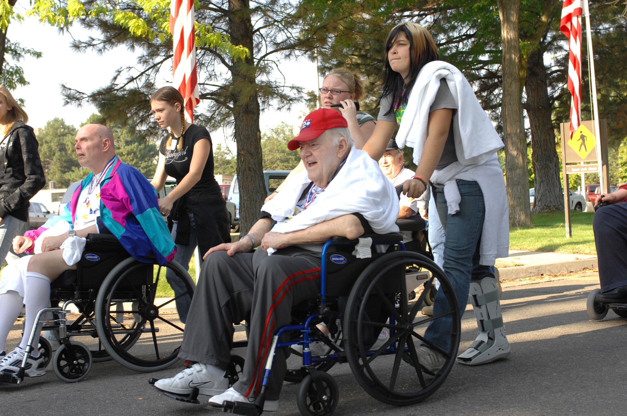 MOUNTAIN HOME AIR FORCE BASE, Idaho -- Volunteers and participants of the 20th annual Idaho Veterans Olympics kick off the day's events with a parade at the Veterans Home in Boise Sept. 15. Hosted by the Idaho State Veterans Home and the Veterans Affairs medical center, this event relied heavily on the willingness and sacrifice of volunteers, said retired Chief Master Sgt. Phil Hawkins, one of the Veterans Olympics coordinators. (U.S. Air Force photo/Airman 1st Class Ryan Crane)