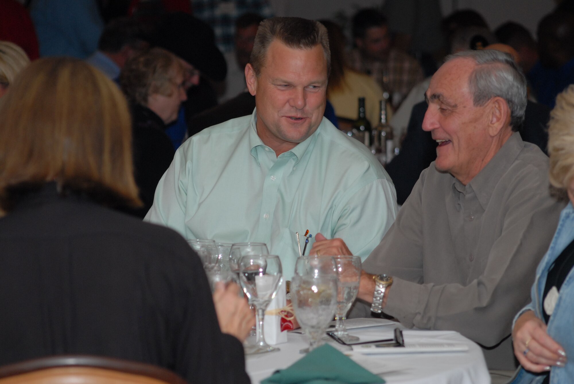 Montana Senator Jon Tester and 341st Mission Support Group co-commander Warren Wenz share a lighter moment at the Salute to the Community Dinner Sept. 14. The event is held annually for the 341st Space Wing commander to thank the people of Great Falls and the communities in the missile complex for their continued support. (U.S. Air Force photo/John Turner)