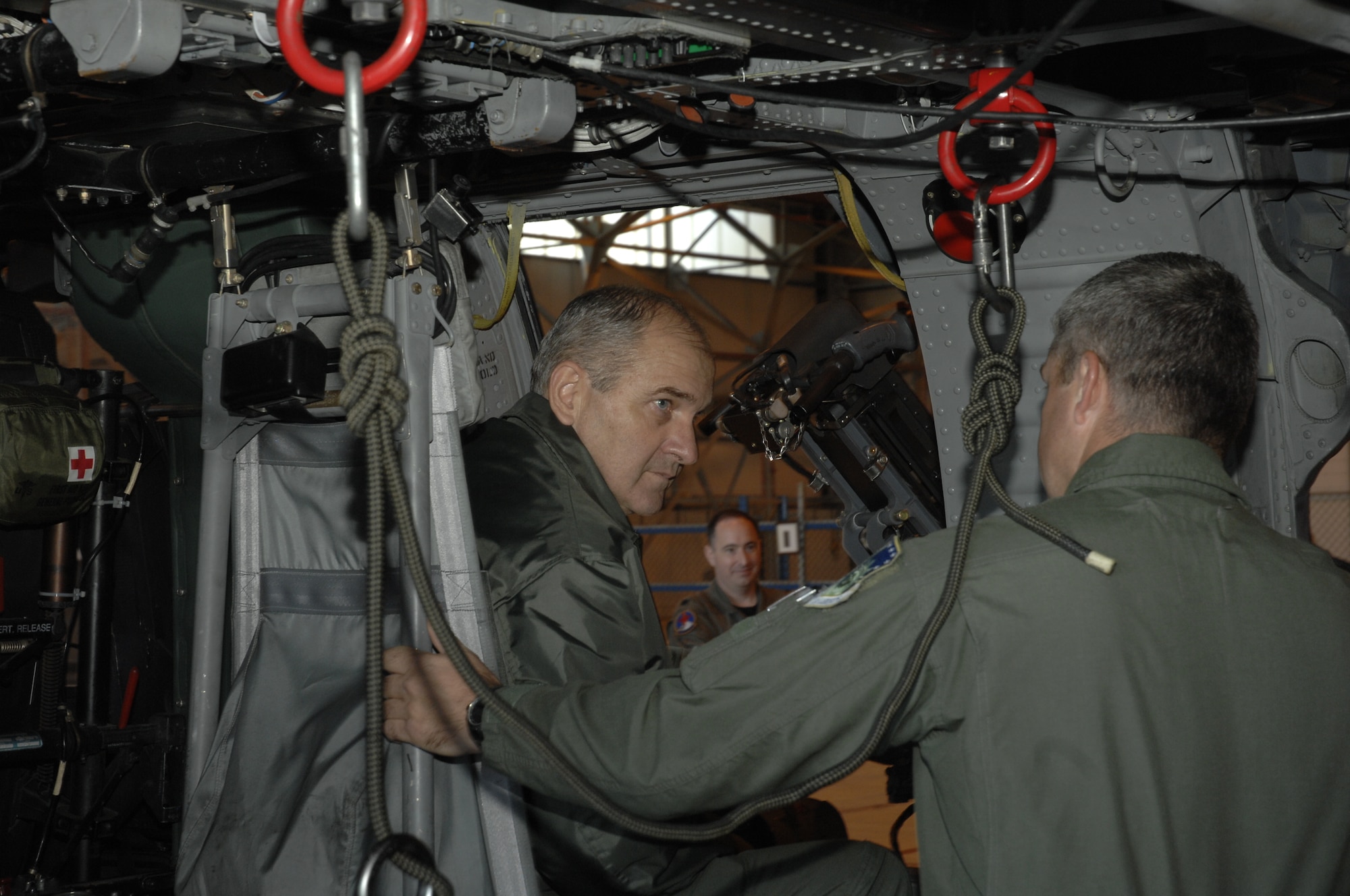 Master Sgt. Travis West, 48th Operations Group, briefs Bulgarian Lt. Gen. Simeon Simeonov, Chief of Bulgarian Air Force Headquarters on various advantages the 56th Rescue Squadron HH60’s provide for the pilots and pararescuers Sept. 18. (U.S. Air Force photo by Airman 1st Class Erika Brooke)