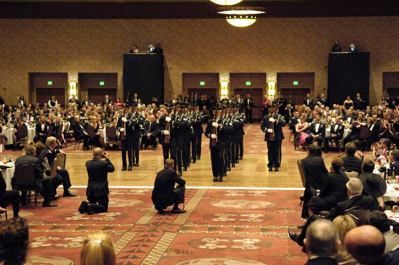 The Air Force Honor Guard Drill Team performs Sept. 14 at the Sandia Resort in Albuquerque, N.M., during the New Mexico State Air Force 60th Anniversary Ball . (U.S. Air Force photo/Senior Airman Daniel DeCook) 