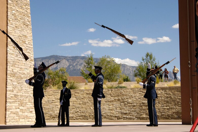 The Air Force Honor Guard Drill Team performs Sept. 14 at the Sandia Resort in Albuquerque, N.M., during the state's celebration of the Air Force's 60th anniversary. Servicesmembers from Holloman, Cannon and Kirkland Air Force Bases were in attendance. (U.S. Air Force photo/Senior Airman Daniel DeCook) 