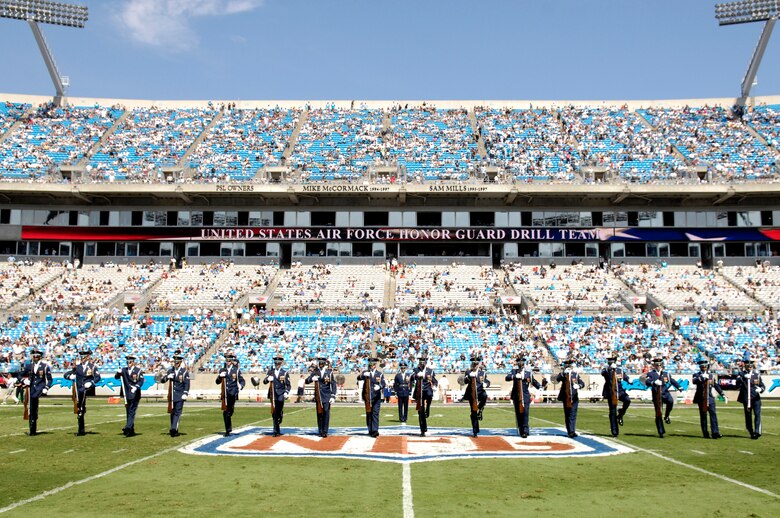 Members of the Air Force Honor Guard Drill Team perform during halftime Sept. 16 at the NFL's Carolina Panthers vs. Houston Texans football game in North Carolina. The performance was part of the team's "Birthday Tour" in commemoration of the Air Force's 60th anniversary. (U.S. Air Force photo/Senior Airman Daniel DeCook)
