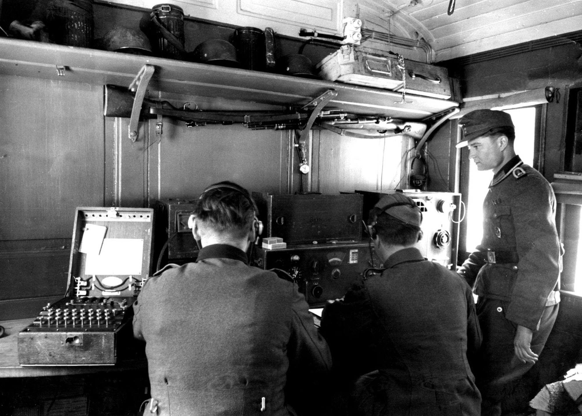 German forces depended on Enigma machines to encode and decode secret messages transmitted over the radio during World War II. The Enigma machine is on the left. (Photo courtesy of Helge Fykse, Norway)