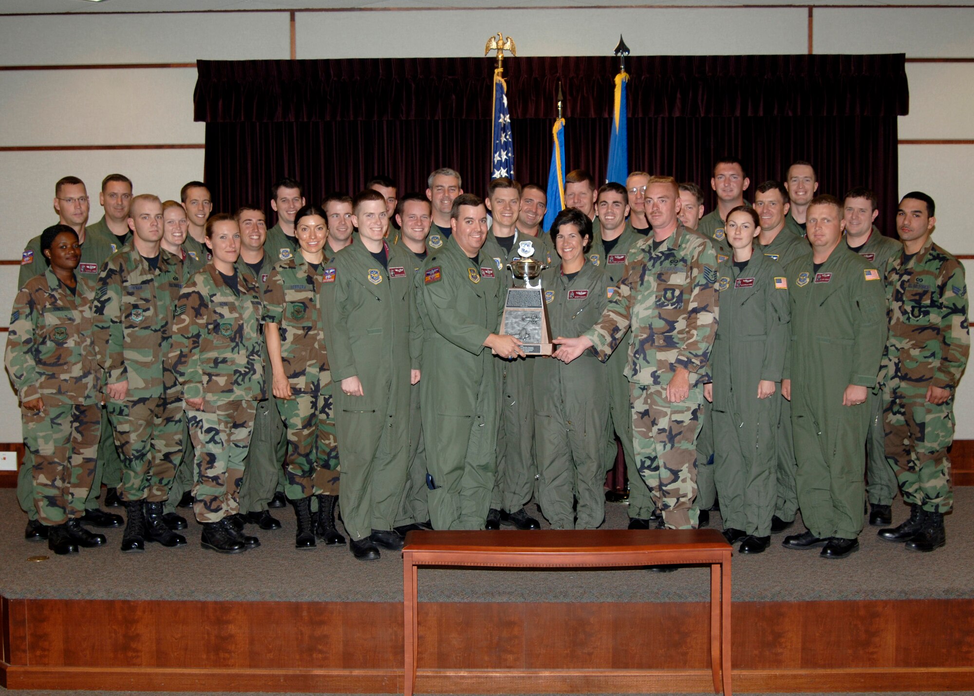 MCCONNELL AIR FORCE BASE, Kan. --The 384th Air Refueling Squadron shows off the Spaatz Trophy presented by Major General Frederick F. Roggero, Director of Air, Space and Information Operations, Headquarters Air Mobility Command, Sept. 14 here. Each year, the Air Mobility Command selects and recognizes the most outstanding Air Refueling Squadron within the command and presents the squadron with the AMC Spaatz Trophy. (photo by Airman 1st Class Roy Lynch III)