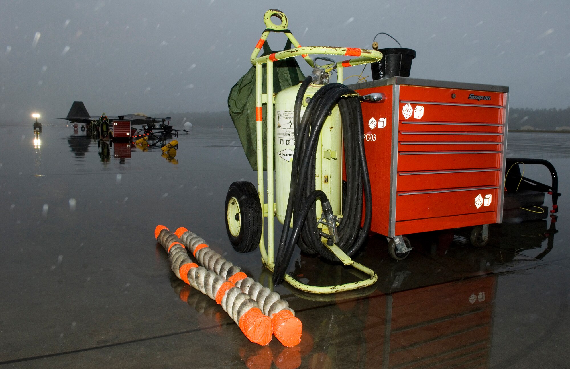 ELMENDORF AIR FORCE BASE, Alaska -- An aircraft maintainer's tool kit endures the elements and rain, keeping tools safely stowed and readied for both maintainers and F-22 Raptors return to the Elmendorf flightline. (U.S. Air Force Photo by Senior Airman Garrett Hothan)