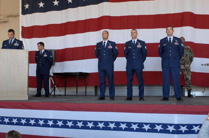 Staff Sgt. David Lance, Staff Sgt. Jeremiah Grisham, and Staff Sgt. Dustin Heines, all with 99th Civil Engineers Squadron Explosive Ordinance Flight, were presented with Bronze Star Medals in a ceremony held in the Explosive Ordinance Disposal Flight Building Equipment Bay Sep.18, 2007.  (U.S. Air Force photo by Staff Sgt. Erin Worley)