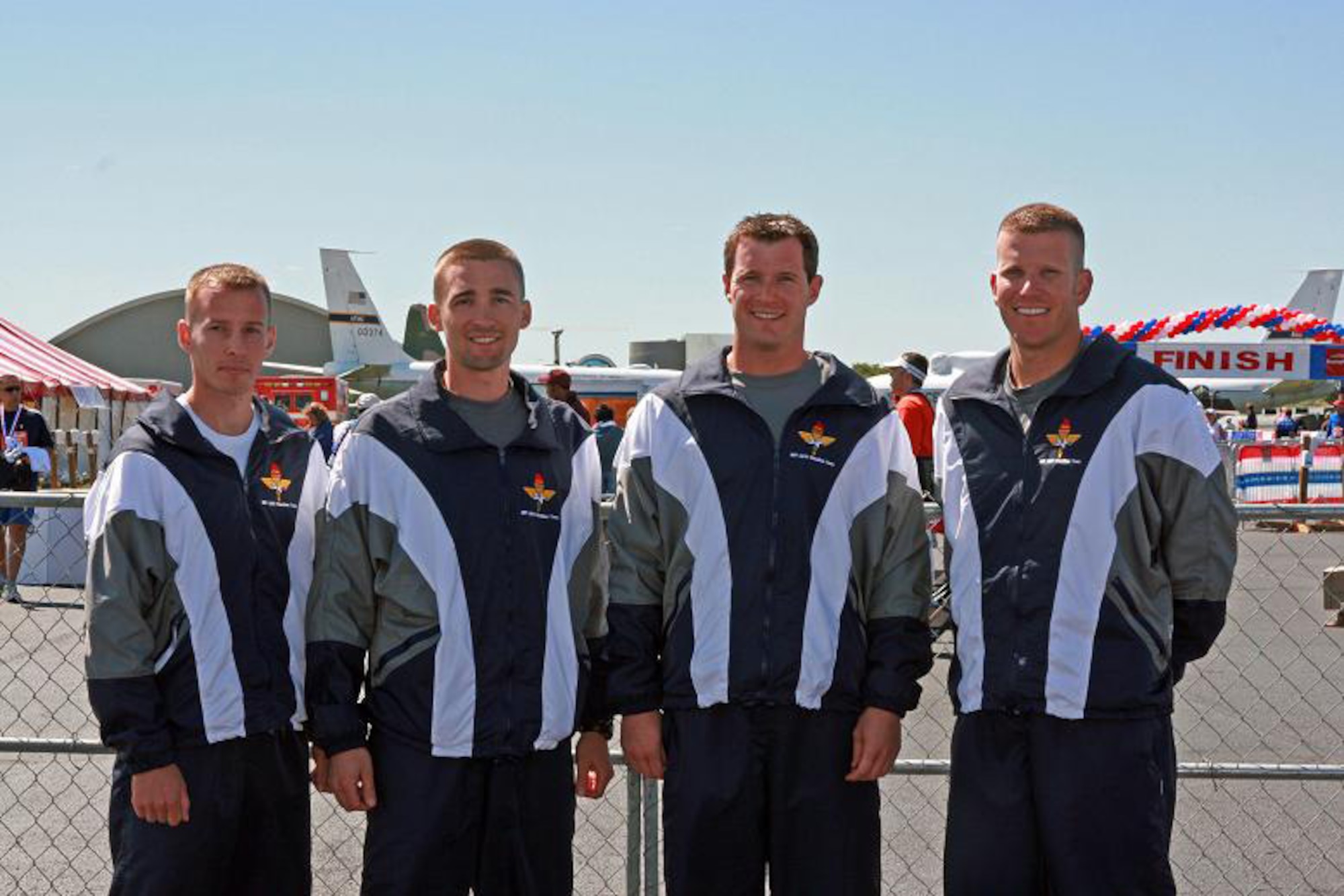 LAUGHLIN AIR FORCE BASE, Texas --1st Lt. Aric Wagner, Capt. Dan Arneson, Capt. John Mirtich, Capt. Aaron Gill, 86th Flying Training Squadron Instructor Pilots, smile for a team victory photo after coming out on top in a highly demanding relay race in the 11th Annual Air Force Marathon at Wright-Patterson Air Forec Base Sep. 15.(U.S. Air Force photo by Capt. Kristi Contardo) 