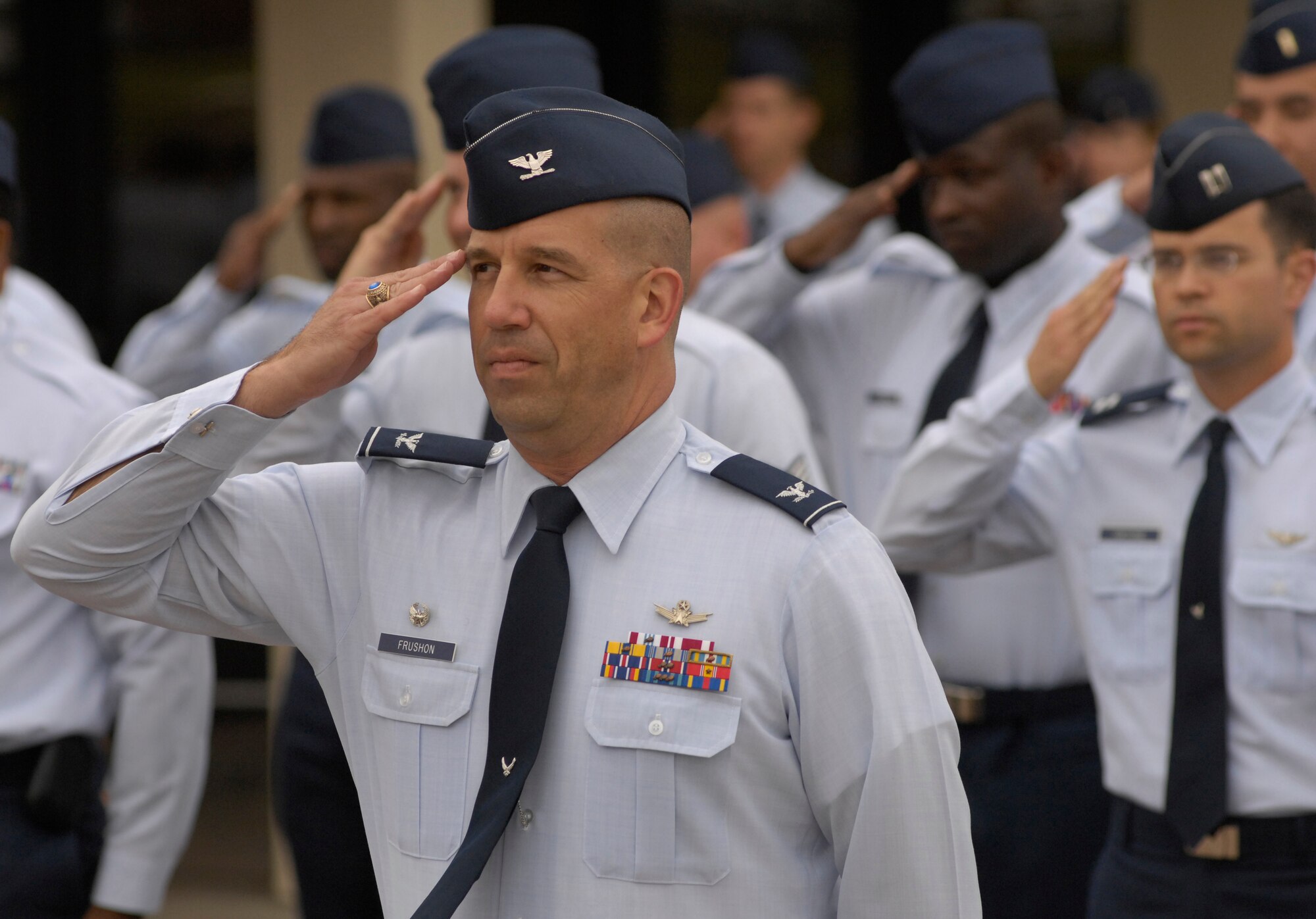 VANDENBERG AIR FORCE BASE, Calif. -- Formations of Vandenberg's four 30th Space Wing groups, the 381st Training Group and the 595th Space Group participate in a retreat ceremony on Sept. 18 in front of Bldg. 10577 to celebrate the Air Force's 60th Anniversary. The retreat was followed by a cake cutting ceremony in the Pacific Coast Club. (U.S. Air Force photo/Airman 1st Class Matthew Plew)