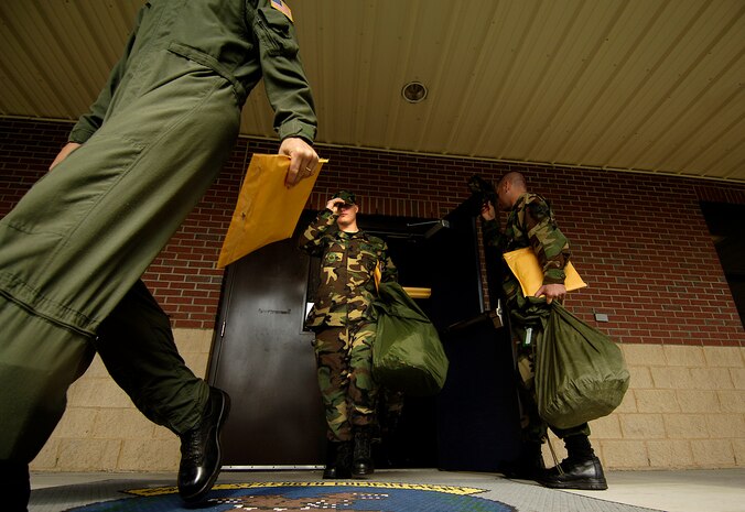 Airmen from Charleston AFB process the line before heading to a deployment Sept. 13 at the 437th Logistics Readiness Squadron headquarters building on Charleston AFB. (U.S. Air Force Photo/Tech. Sgt. Jeremy Lock)