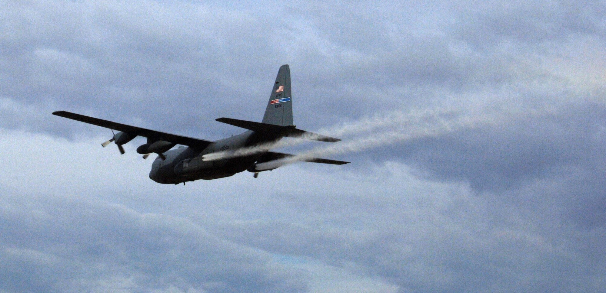 MOUNTAIN HOME AIR FORCE BASE, Idaho -- A specially modified C-130 Hercules aircraft conducts an herbicide aerial spray mission over the base’s Saylor Creek Range in 2007. Beginning Sept. 14 and lasting though Sept. 28, approximately 3,200 acres of Air Force land in Owyhee County will be sprayed with the herbicide Plateau® to reduce the growth of cheatgrass -- an invasive, non-native grass that chokes out native vegetation and has contributed to recent catastrophic range fires. (U.S. Air Force photo/ Staff Sgt. Rodney D. Ivey)