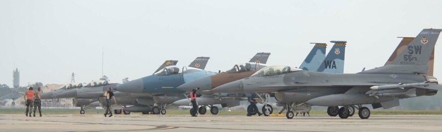 SHAW AIR FORCE BASE, S.C. -- F-16 Fighting Falcons assigned to the 20th Fighter Wing and F-15 Eagles assigned to the 65th Aggressor Squadron from Nellis AFB, Nev., prepare to take off for an air-to-air training mission Sept. 13. The 65th AGRS specialize in replicating real-world threats and adversaries to train U.S. and allied forces, facilitating optimum understanding of all possible enemy tactics. (U.S. Air Force Photo/Airman 1st Class Matthew Davis)