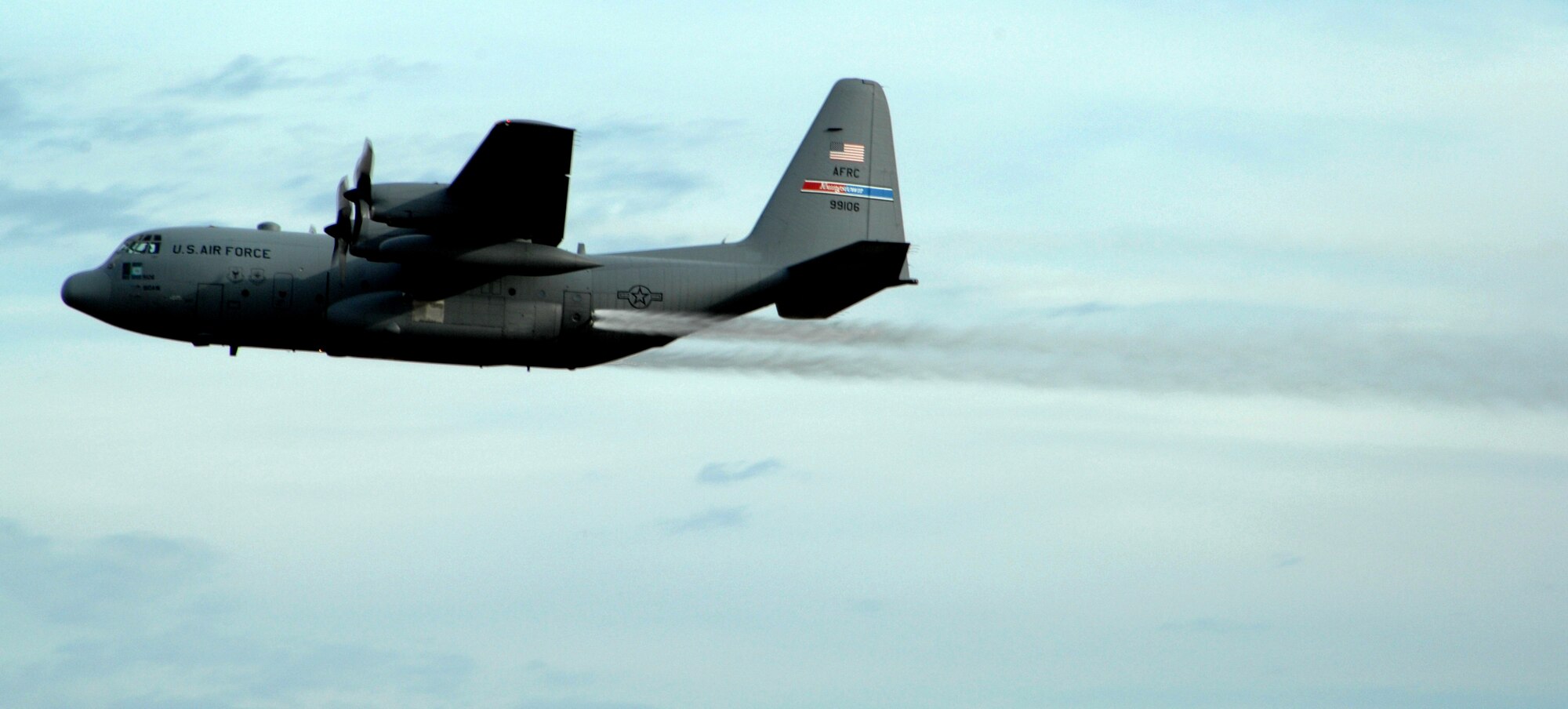 MOUNTAIN HOME AIR FORCE BASE, Idaho -- A specially modified C-130 Hercules aircraft conducts an herbicide aerial spray mission over the base’s Saylor Creek Range in 2007. Beginning Sept. 14 and lasting though Sept. 28, approximately 3,200 acres of Air Force land in Owyhee County will be sprayed with the herbicide Plateau® to reduce the growth of cheatgrass -- an invasive, non-native grass that chokes out native vegetation and has contributed to recent catastrophic range fires. (U.S. Air Force photo/ Airman 1st Class Stephany Miller)