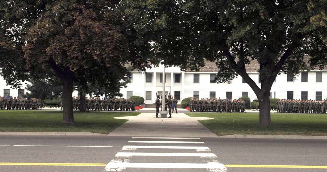 Airmen stand at ease while they await the playing of "To the Colors" before the retreat ceremony Sept. 18 at Fairchild Air Force Base, Wash. The event was in honor of the 60th birthday of the Air Force. (U.S. Air Force photo/Senior Airman Chad Watkins) 